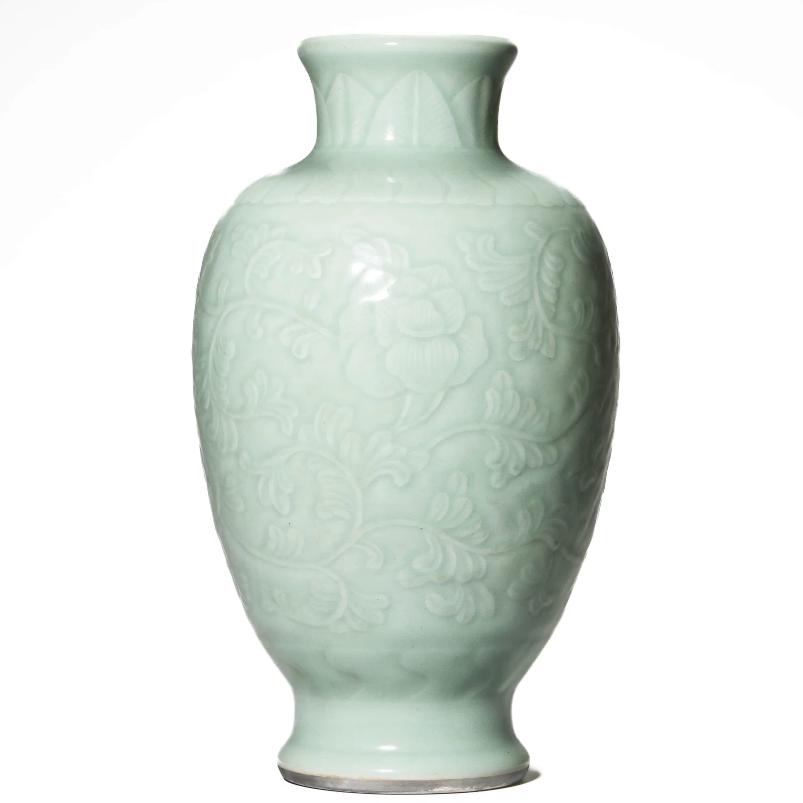 A CELADON-GLAZED CARVED FLORAL VASE.