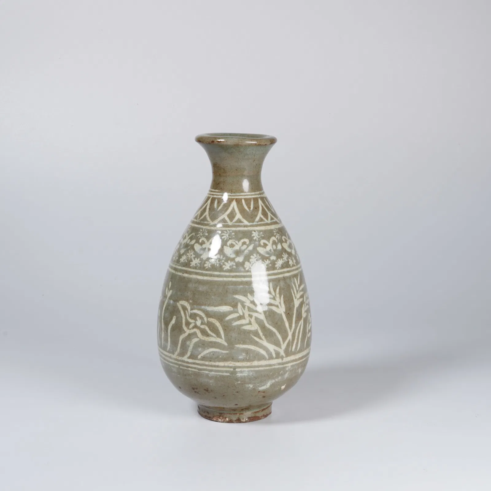 A CELADON YUHUCHUN VASE WITH FLORAL MOTIF