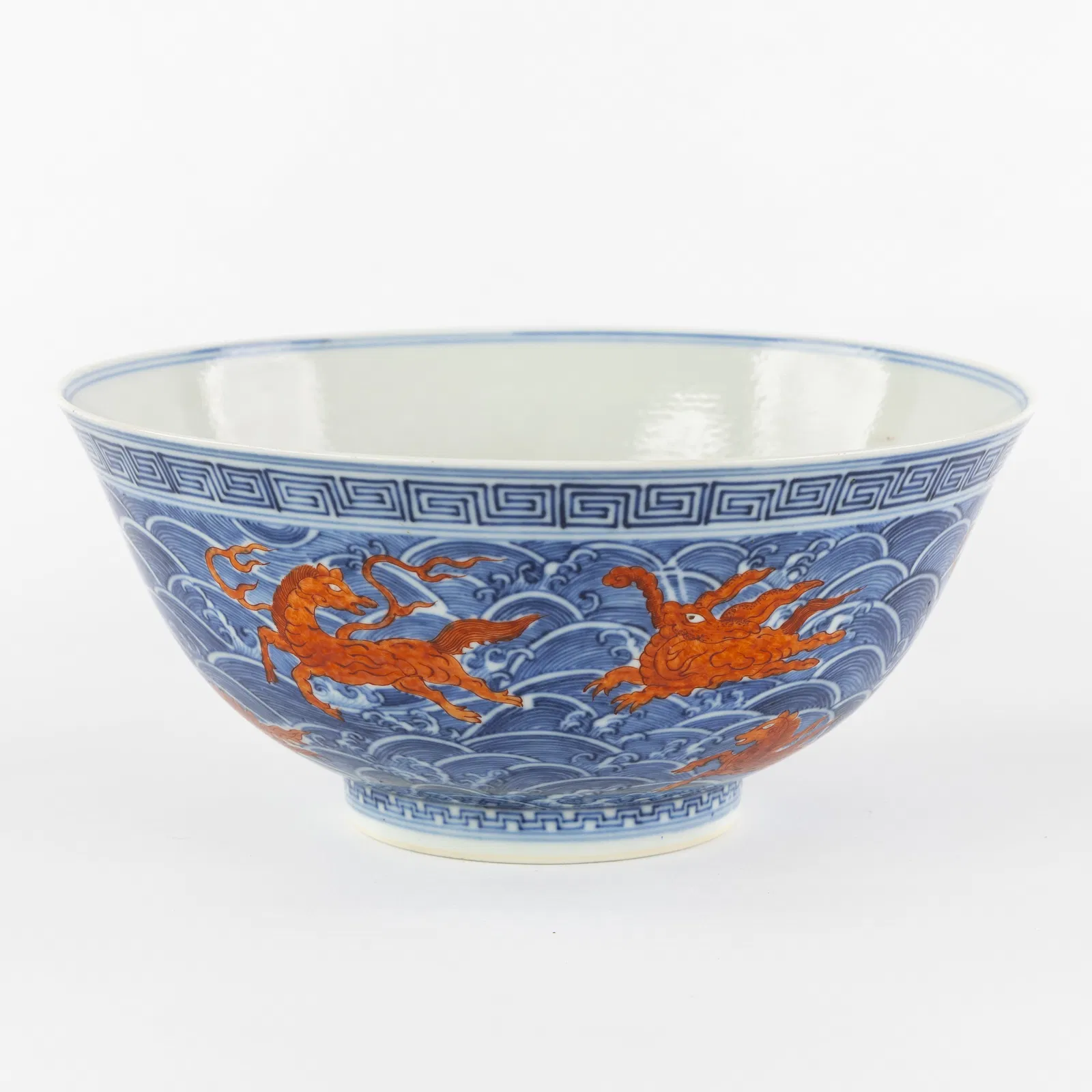 A Chinese blue-and-white bowl, decorated with iron-red 'sea creatures', Guangxu marked and period,