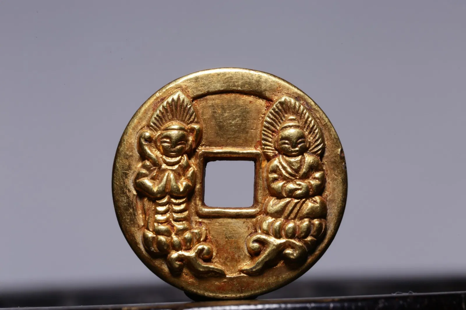 A Chinese Carved Gold Coin