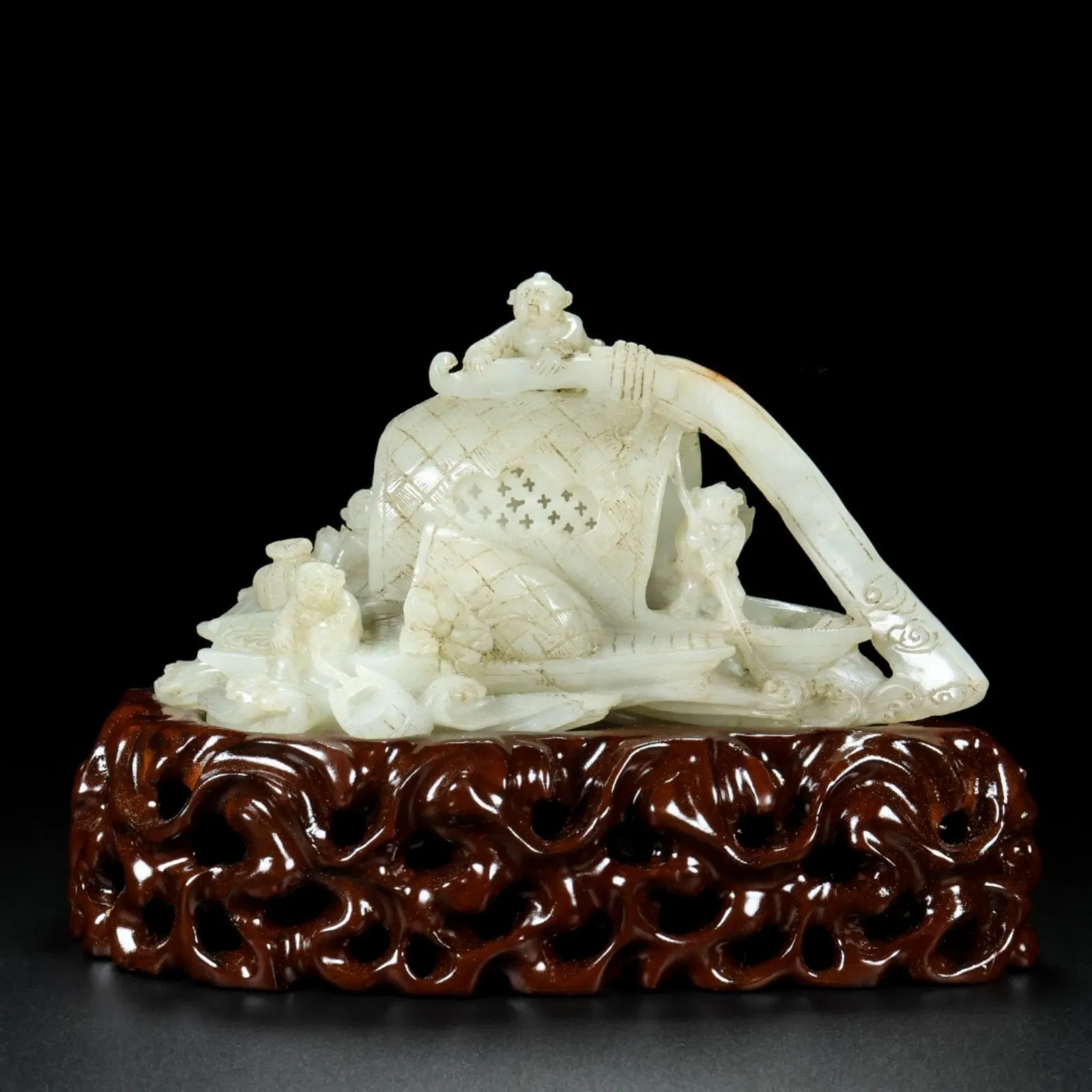 A Chinese Carved Jade Boat Decoration with Stand