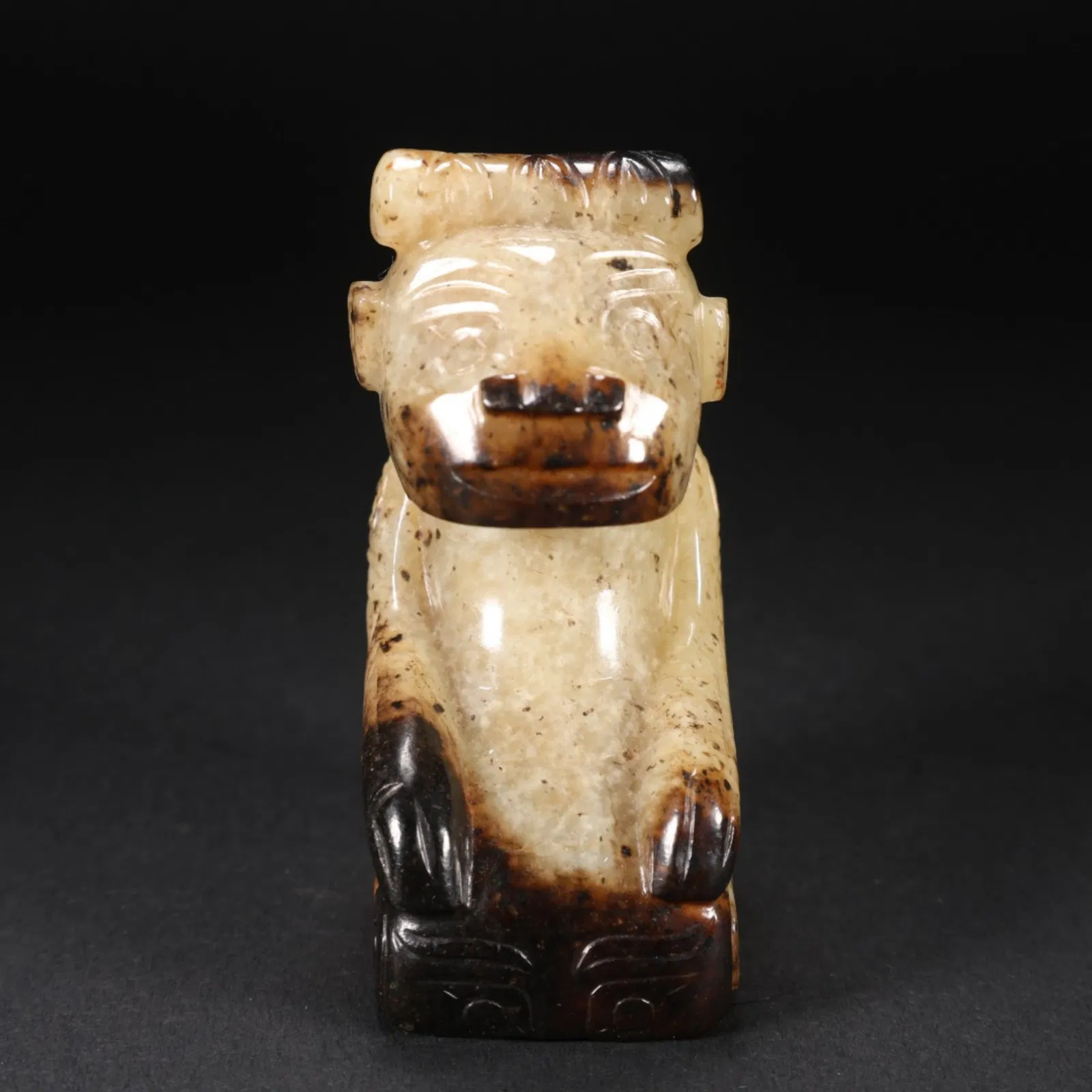 A Chinese Carved Jade Figure of Kneeling Man