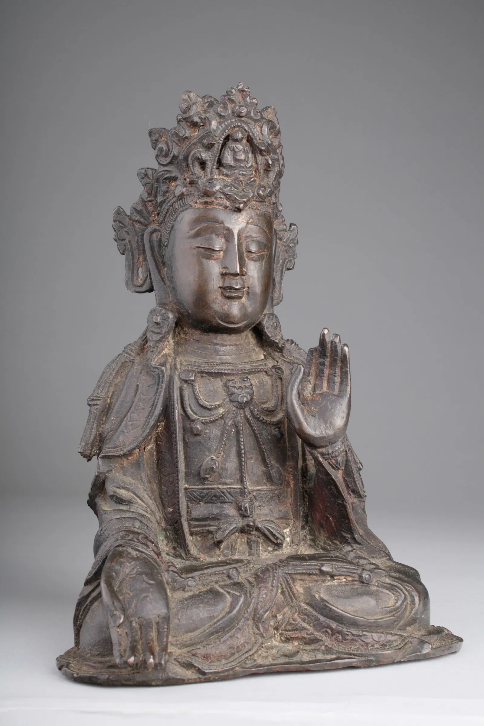A Chinese Cast Bronze Seated Figure of Guanyin, Ming Dynasty