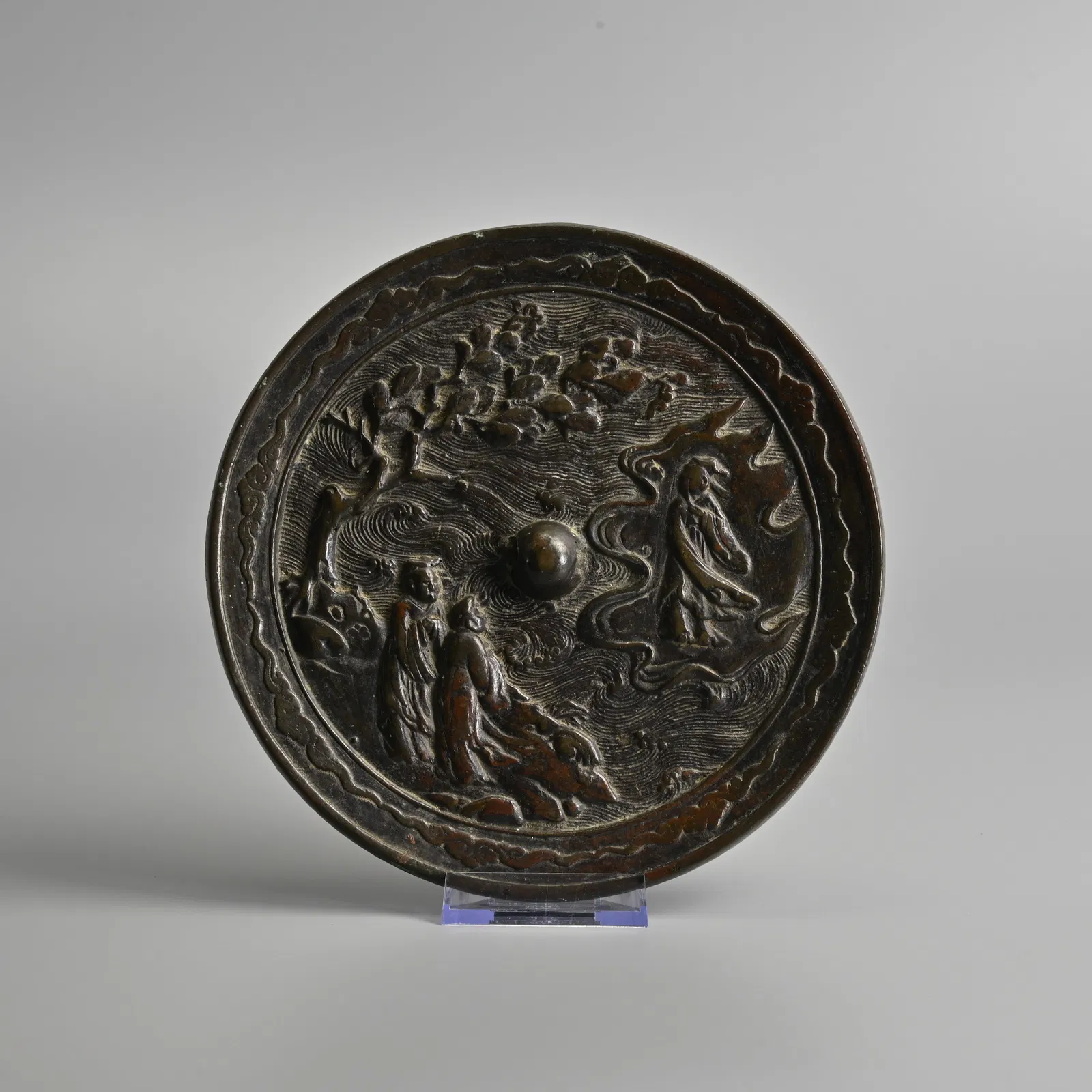 A CHINESE CIRCULAR BRONZE MIRROR, QING DYNASTY.