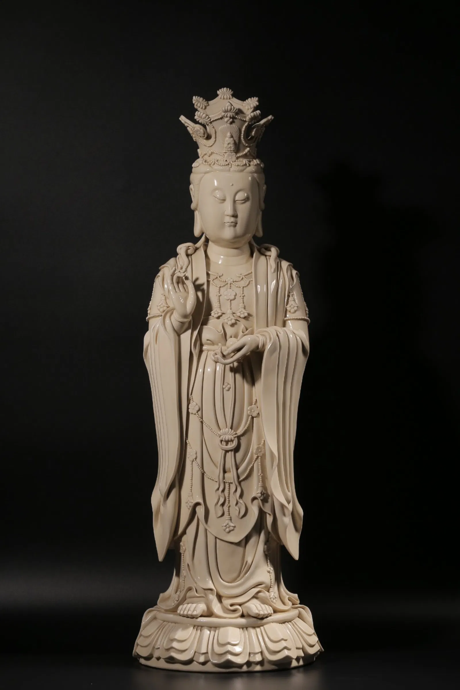A Chinese De Blanc White Glazed Porcelain Figure of Buddha