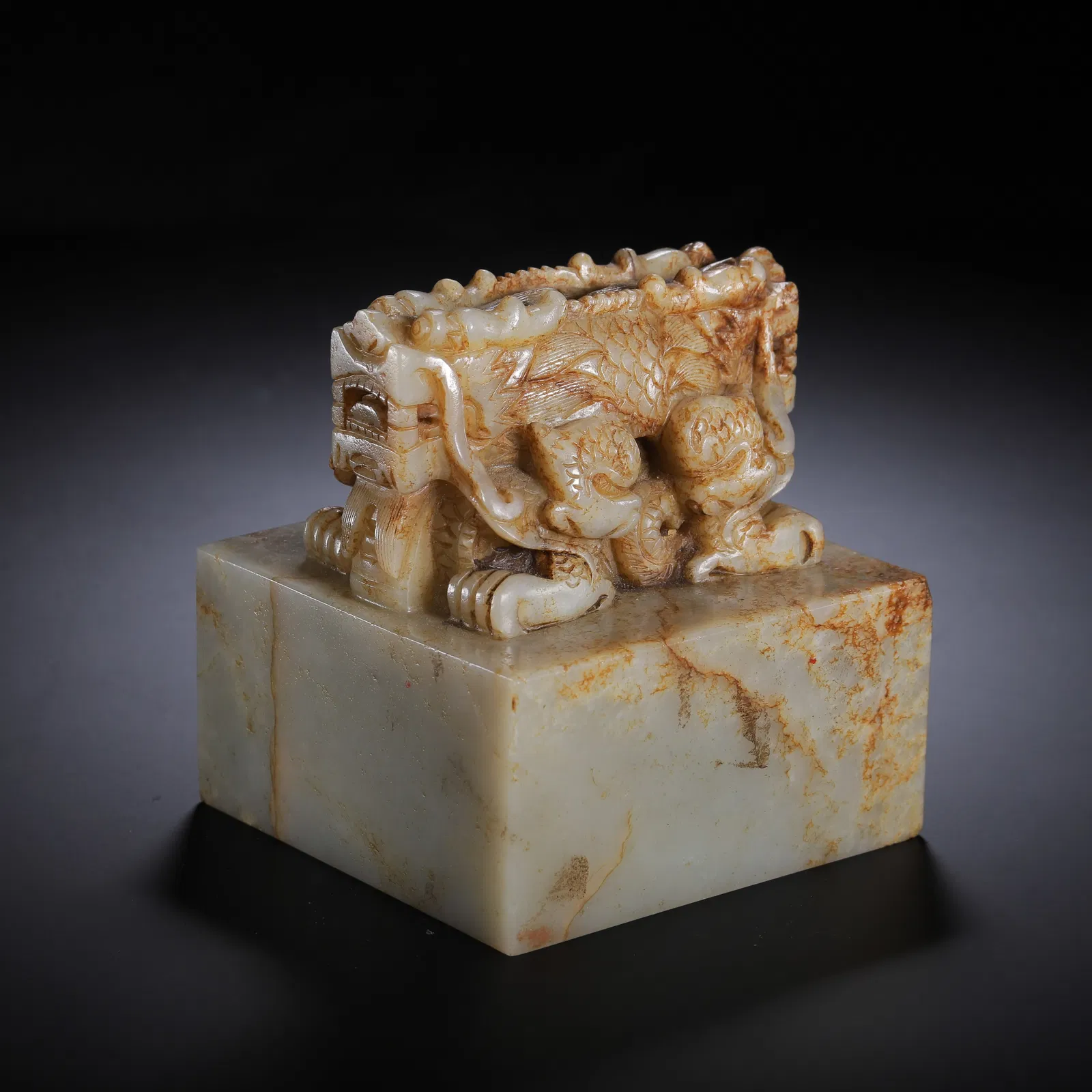 A CHINESE HETIAN JADE SEAL WITH DRAGON KNOP