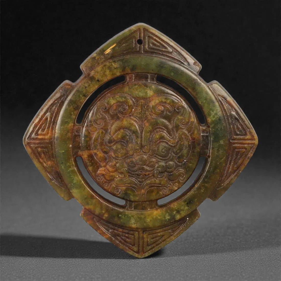 A Chinese Mottled Jade Openwork Disc, 20th Century, 37FD