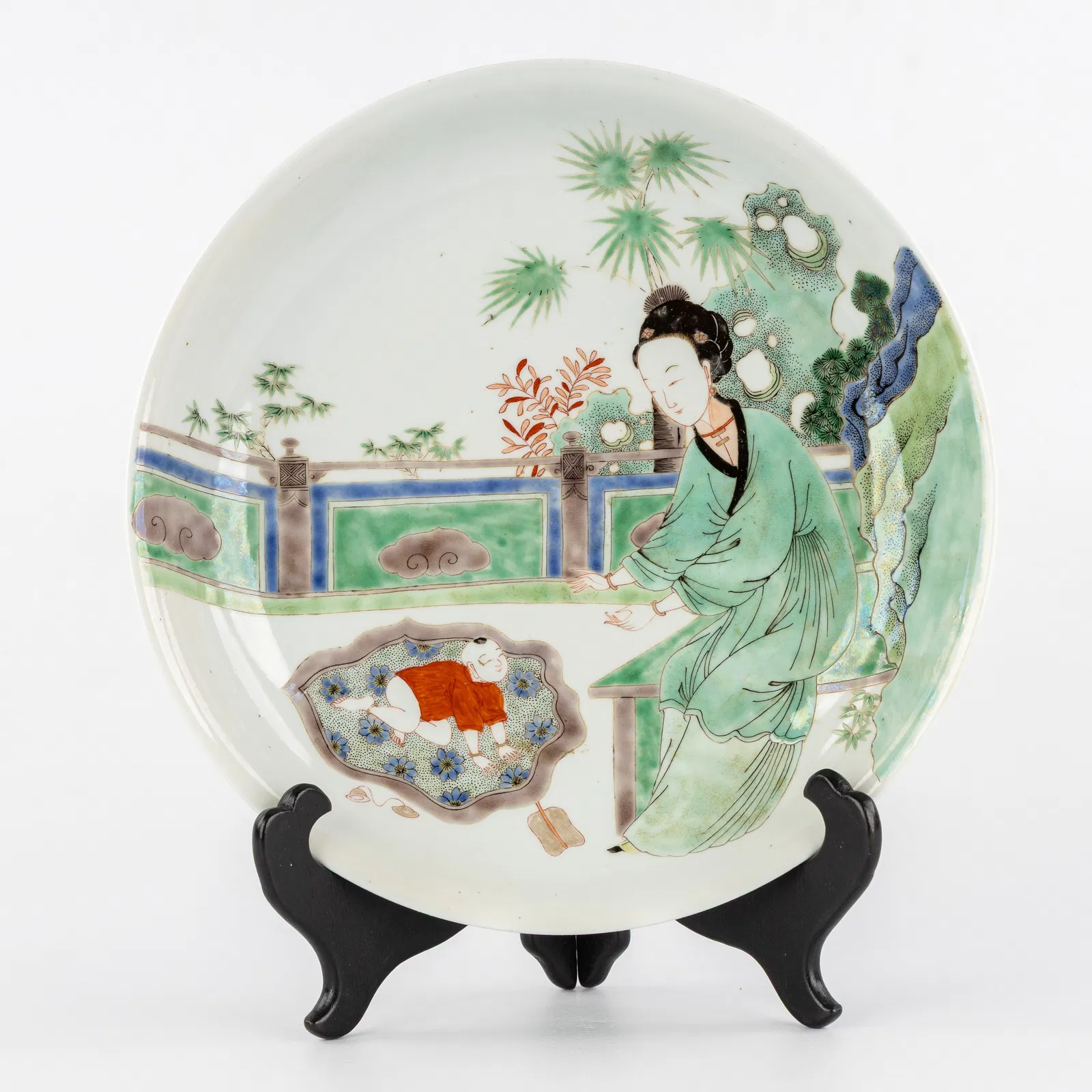 A Chinese porcelain plate, Famille Verte, Lady with Child.