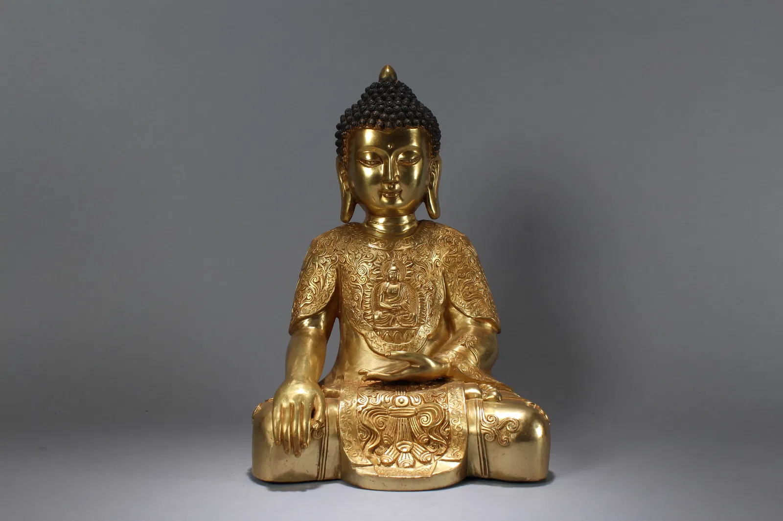 A Chinese Religious Gilt Pondering-pose Fortune Buddha Statue