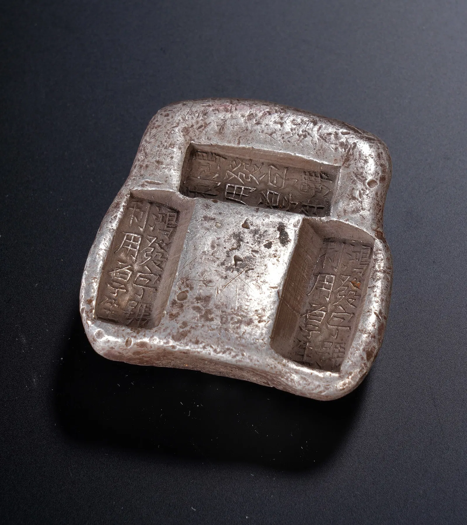 A CHINESE SILVER INGOT