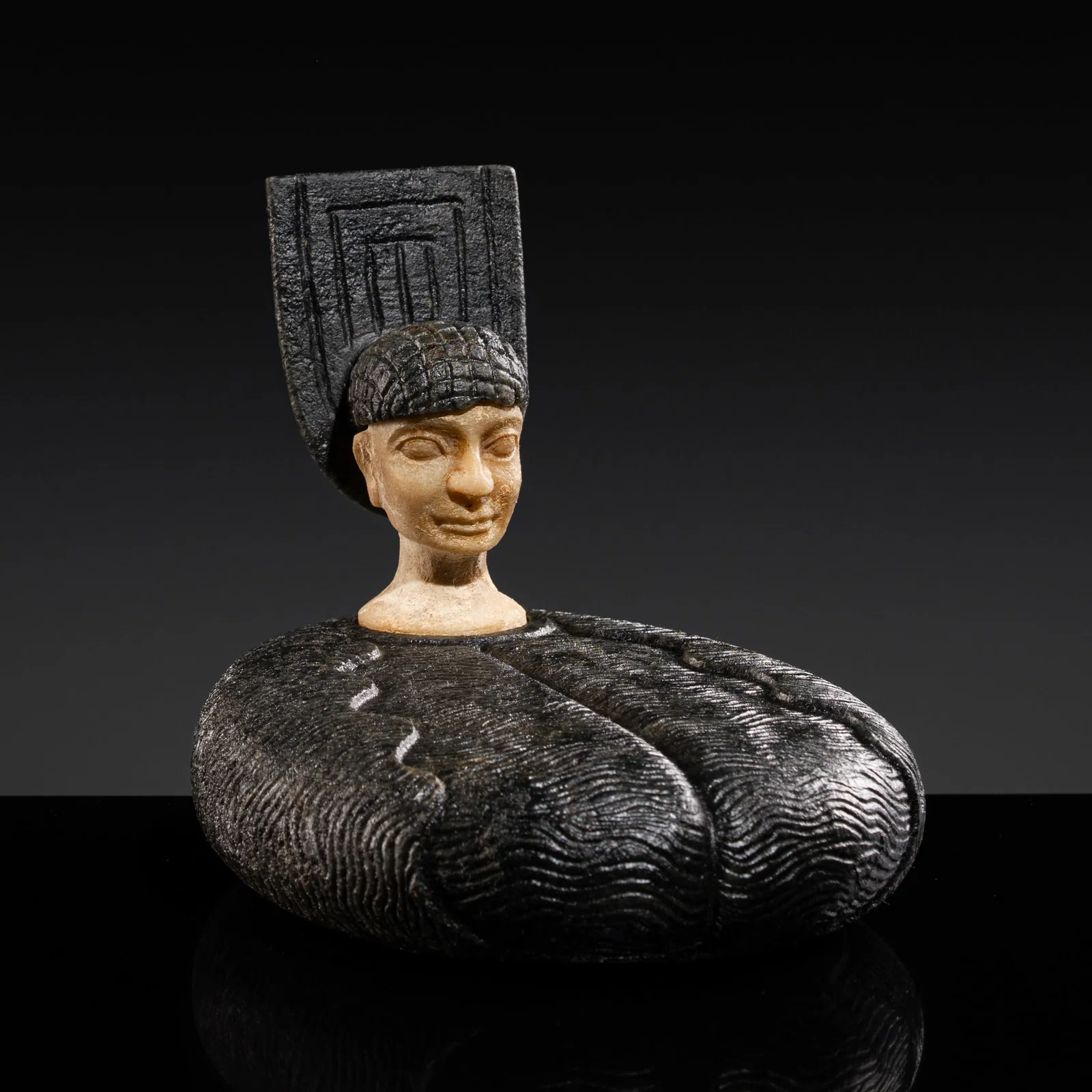 A CHLORITE AND CALCITE COMPOSITE FIGURE OF A BACTRIAN PRINCESS, OXUS CIVILIZATION, 2500-1500 BC