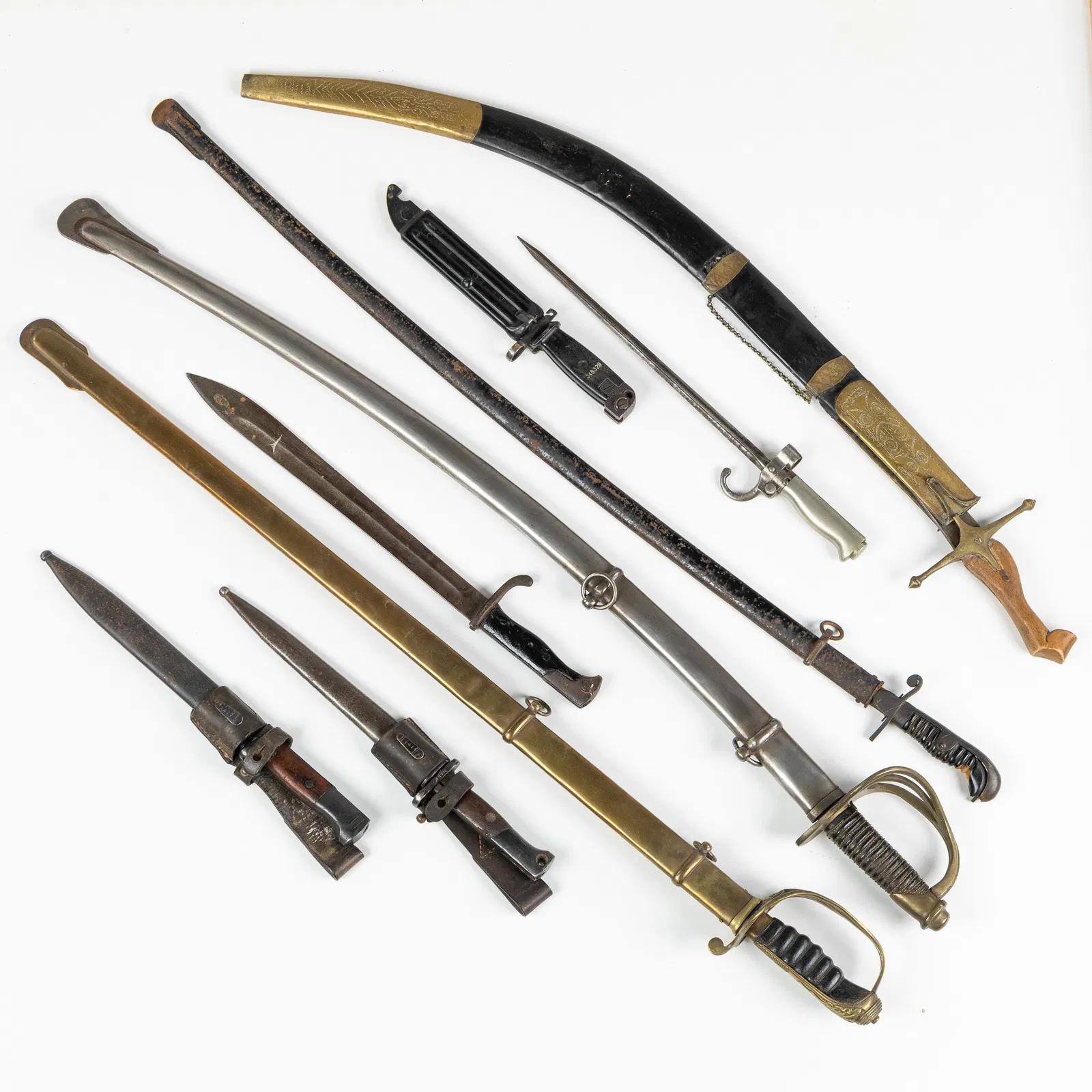 A Collection of swords, sabers, and bayonets, America, Germany, Japan, England, France, and
