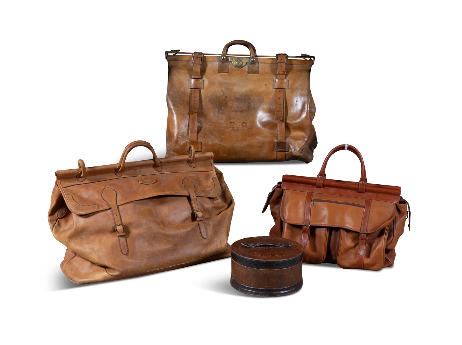 A COLLECTION OF THREE LEATHER BAGS including two large gladstone examples, one by Gastine Renette,