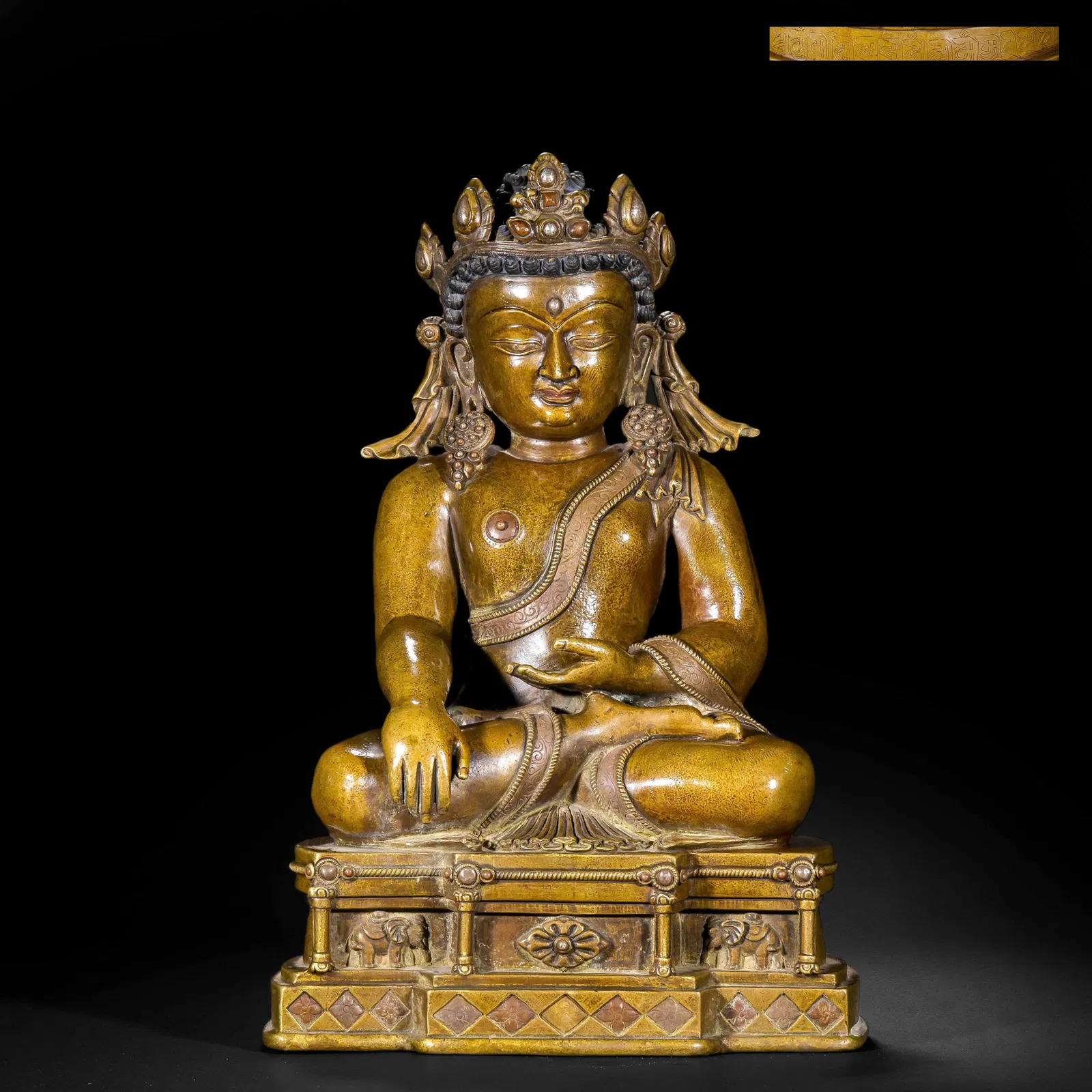 A COPPER ALLOY FIGURE OF CROWN BUDDHA