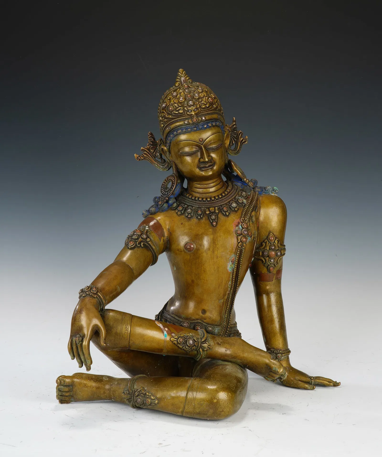 A COPPER ALLOY FIGURE OF INDRA