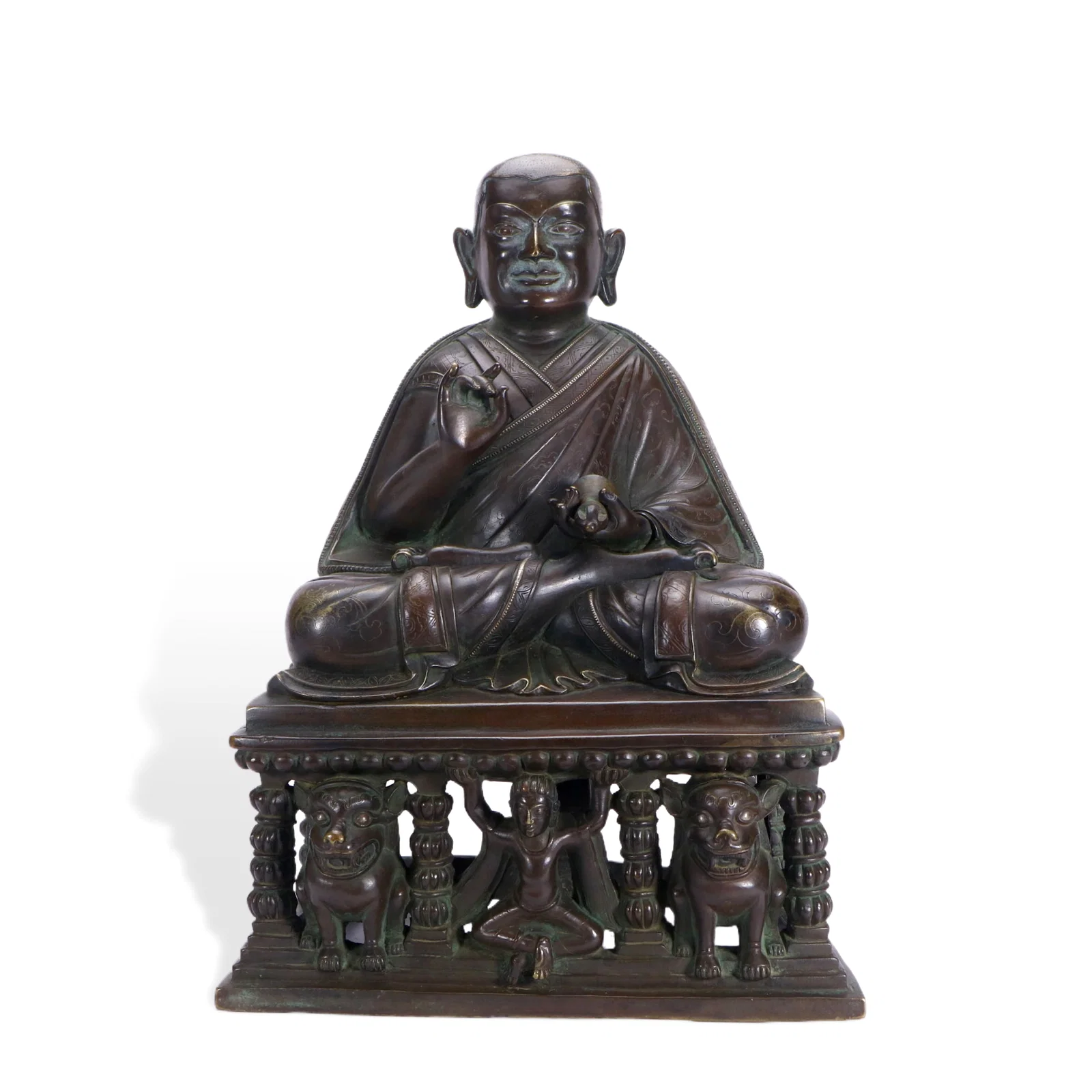 A COPPER FIGURE OF SEATED LAMA