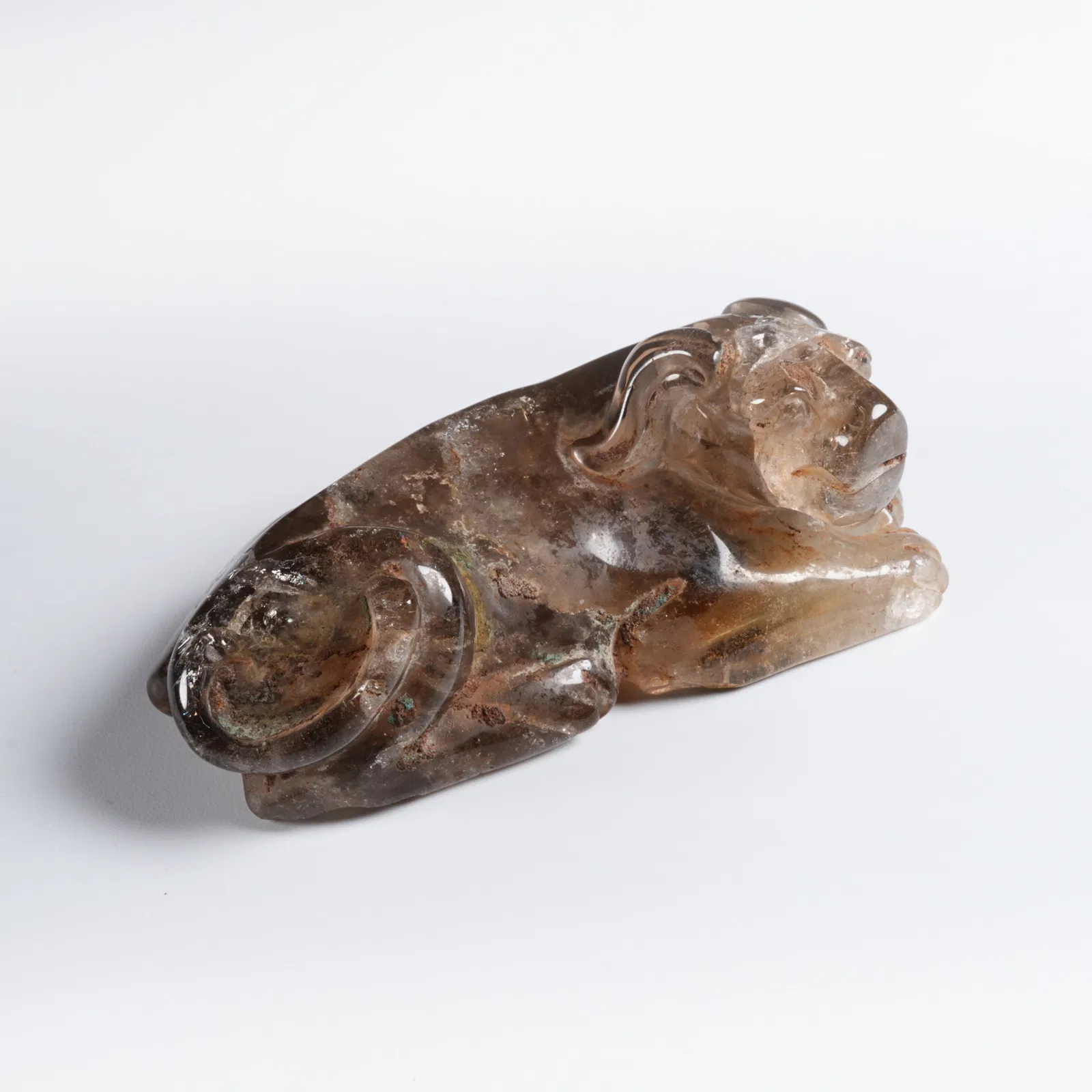 A CRYSTAL MYTHICAL-BEAST PAPERWEIGHT
