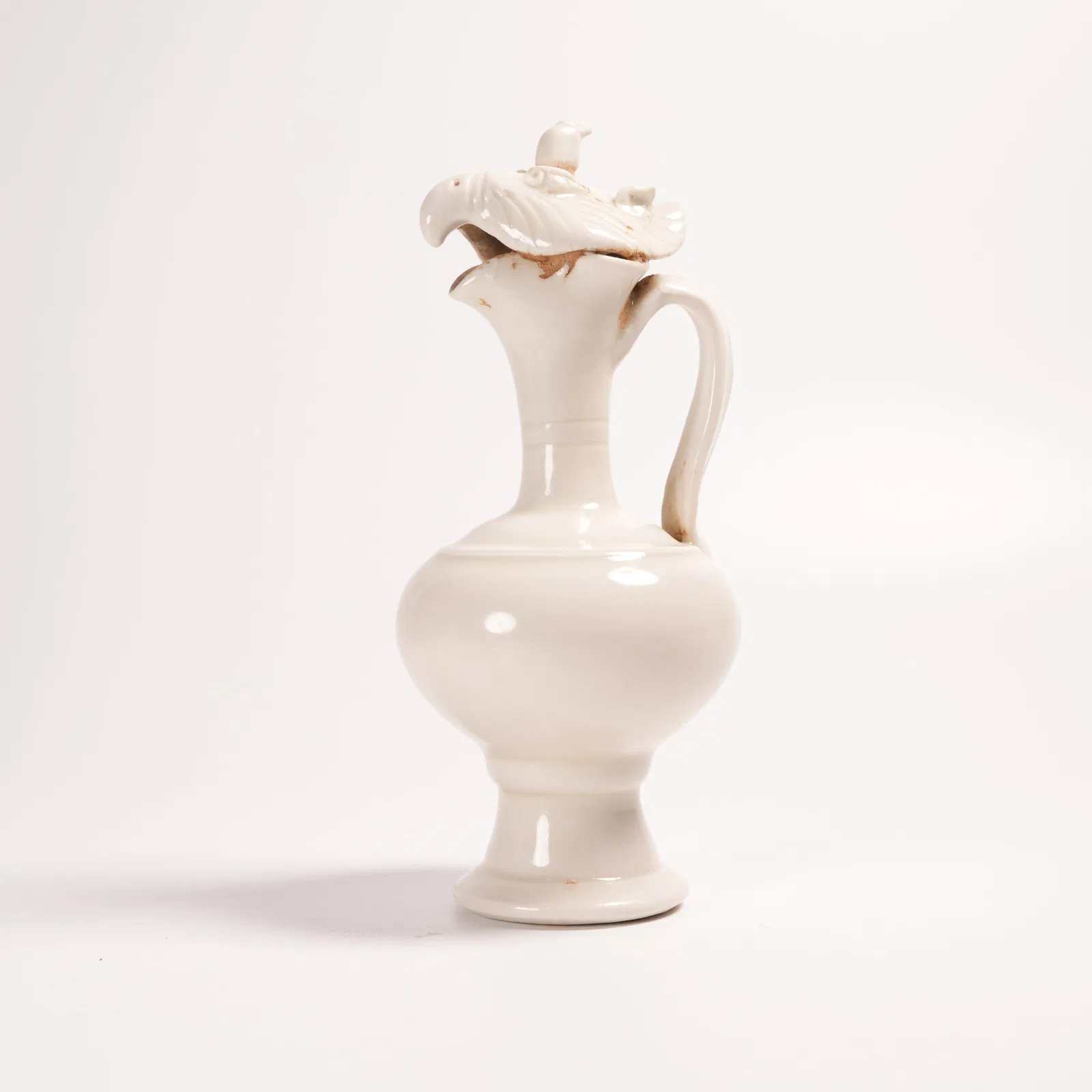 A DING KILN PHOENIX-HEAD EWER