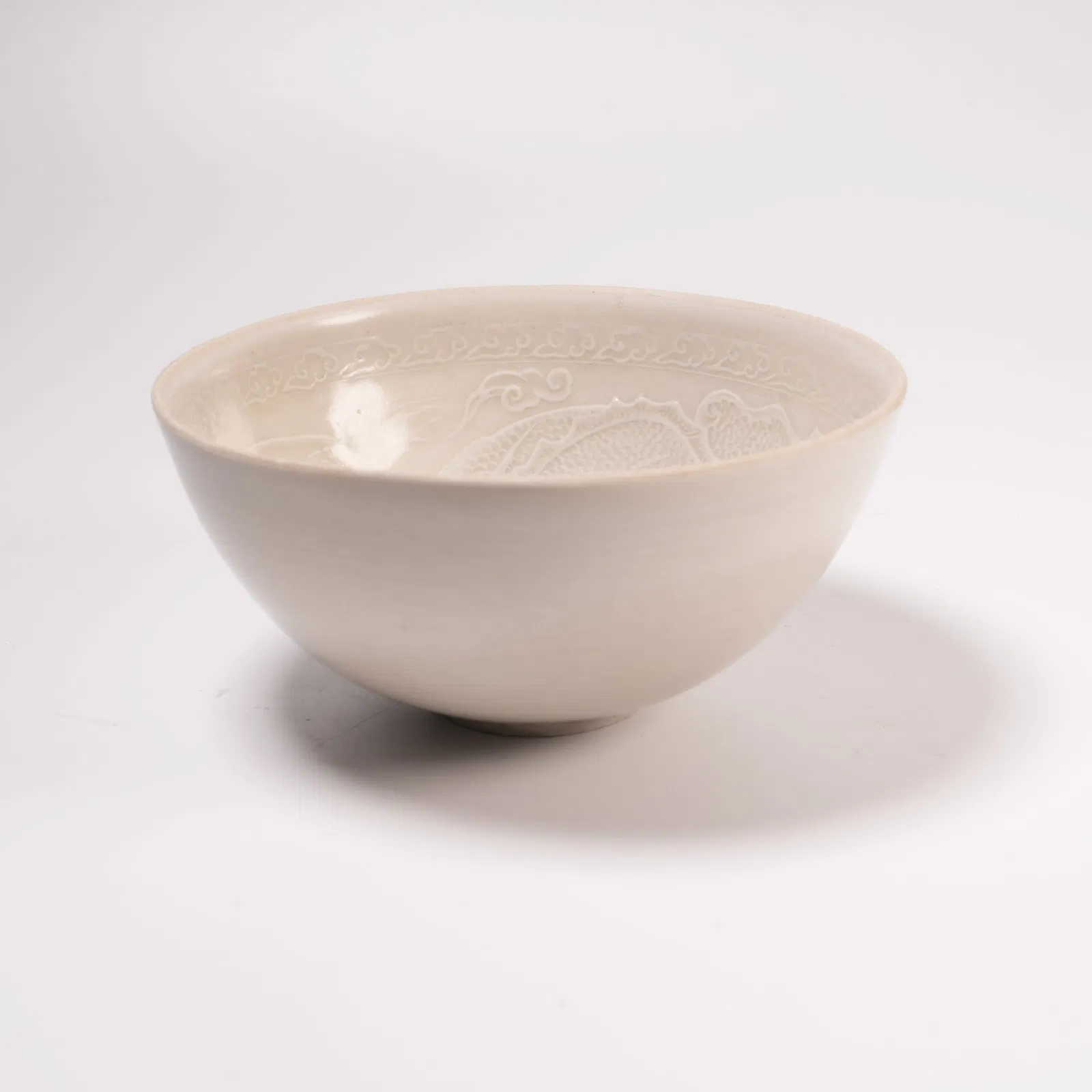 A DING WARE BOWL WITH INCISED DRAGON MOTIF