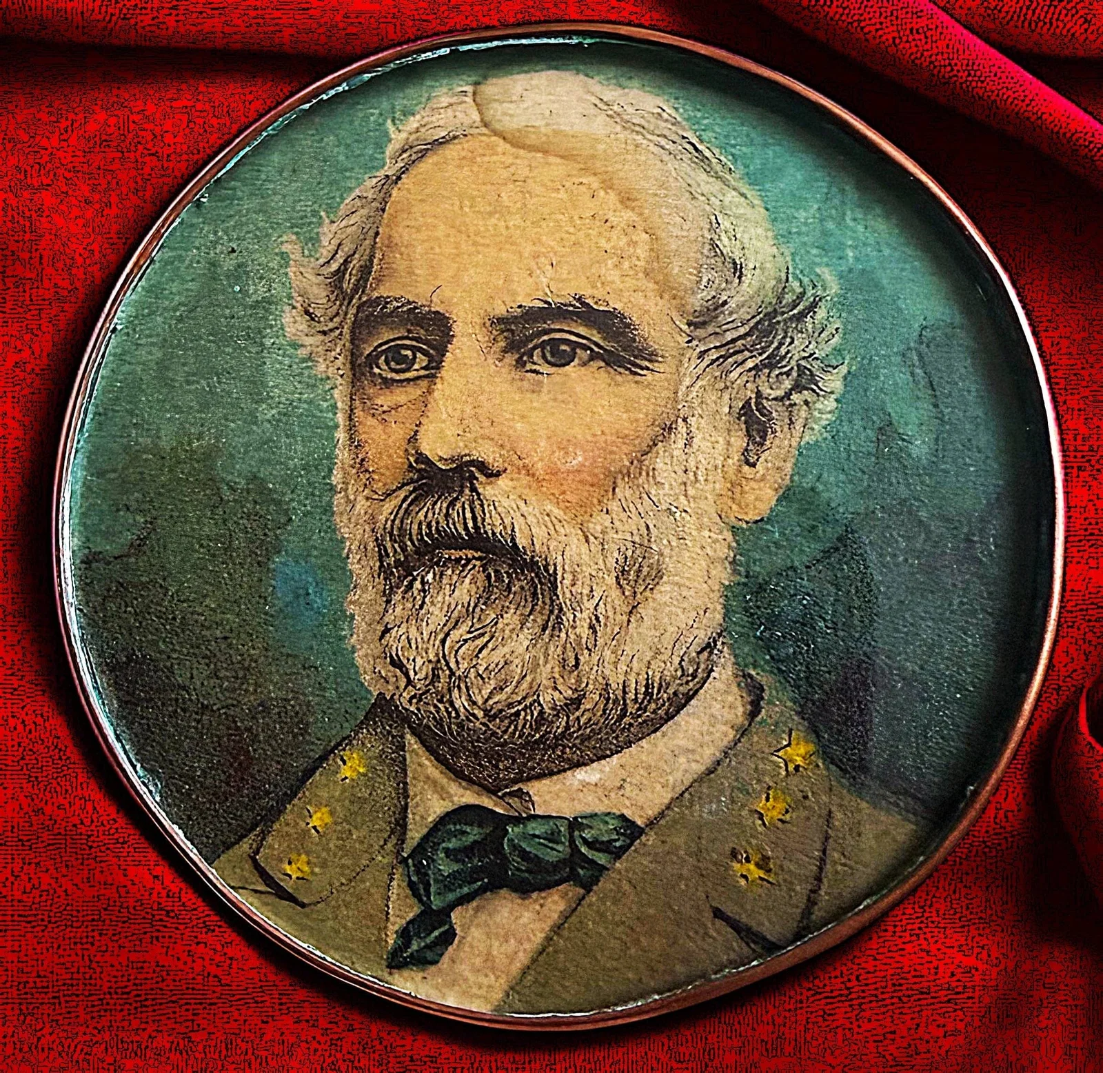 A DIVISION ONE UNDER GLASS FIGURAL BUTTON