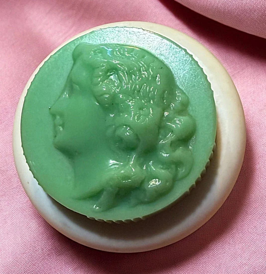 A DIVISON THREE TWO PART COLT BUTTON