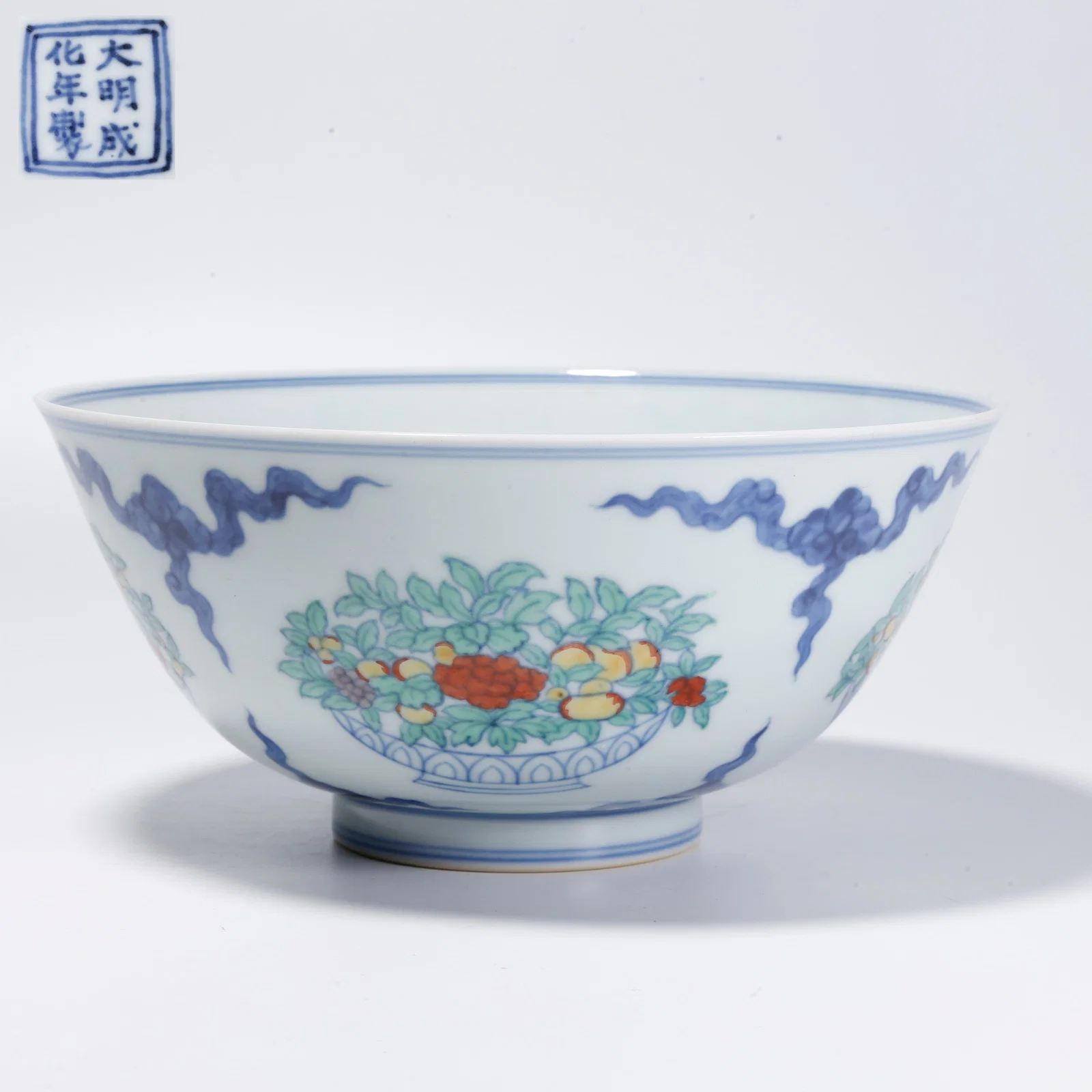 A DOUCAI BOWL WITH MELON AND FRUIT PATTERN