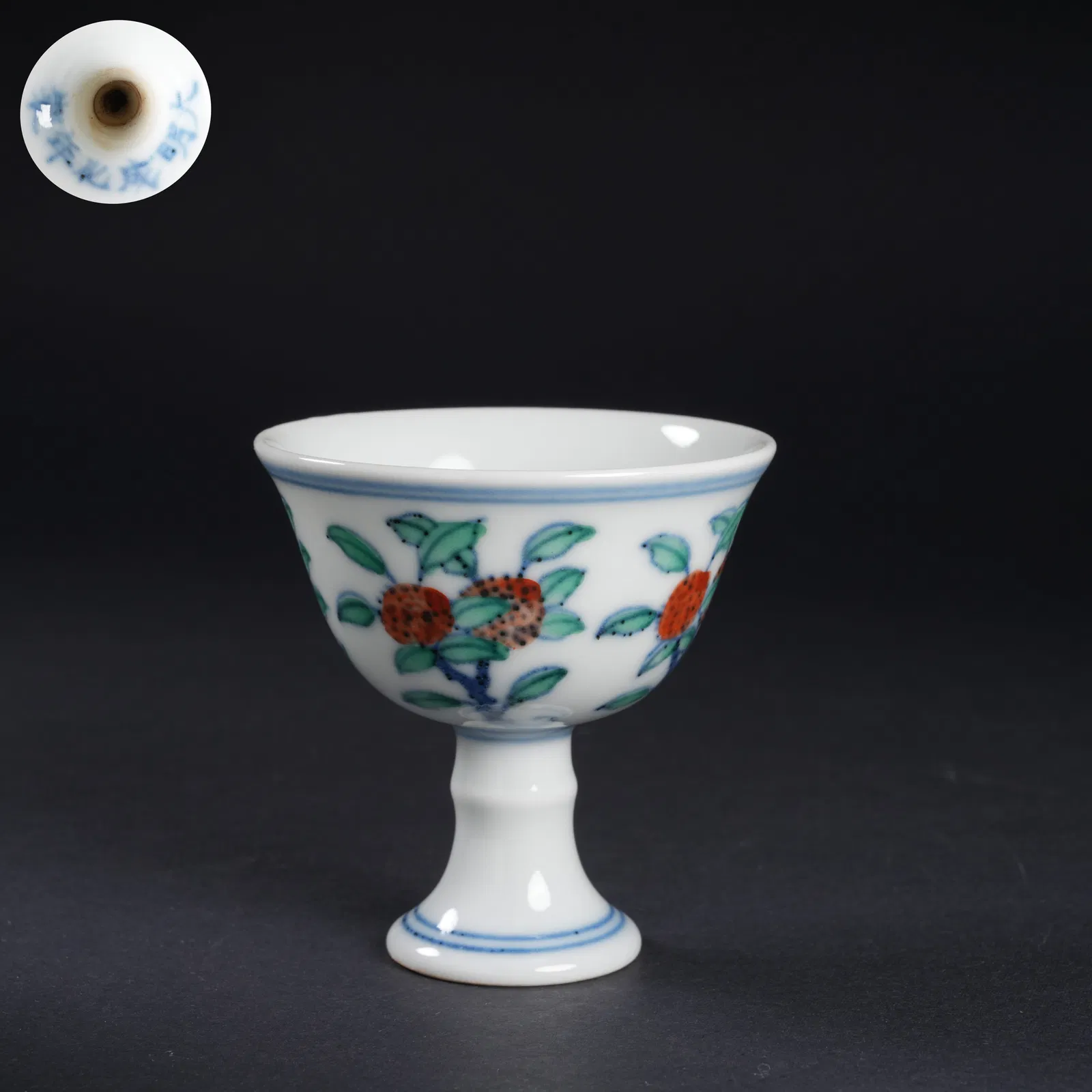 A DOUCAI FLORAL HIGH-FOOTED CUP