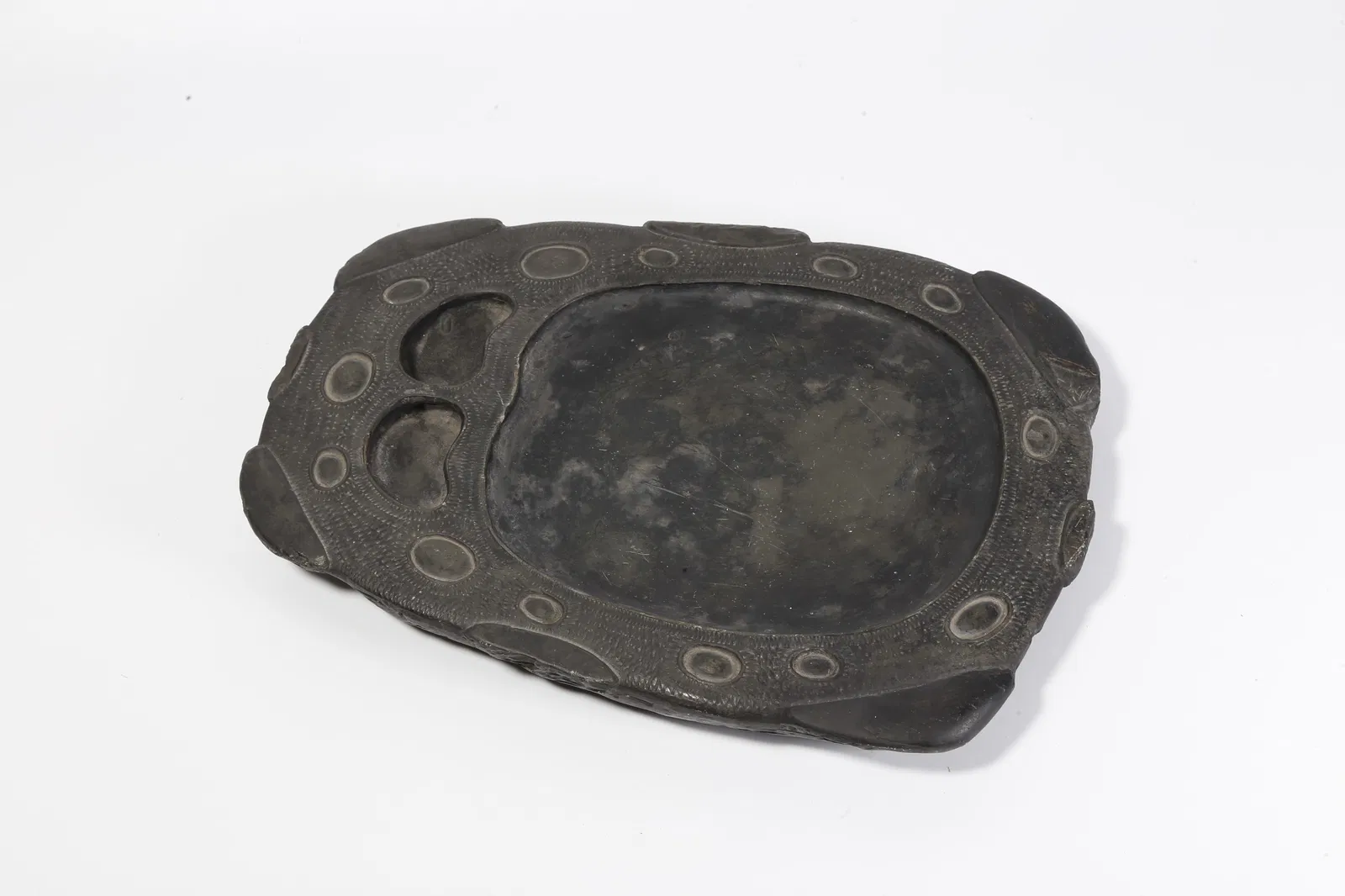 A DUANSHI STONE CARVED INKSTONE