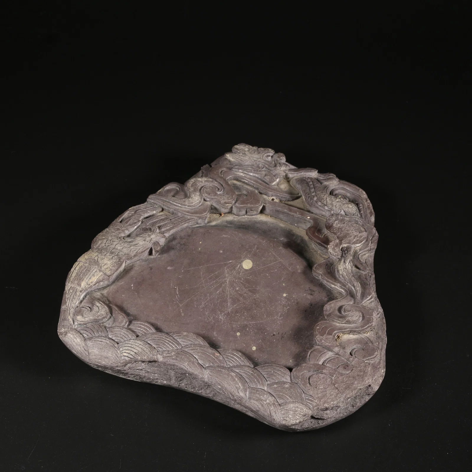 A DUANSHI STONE INKSTONE WITH DRAGON MOTIF