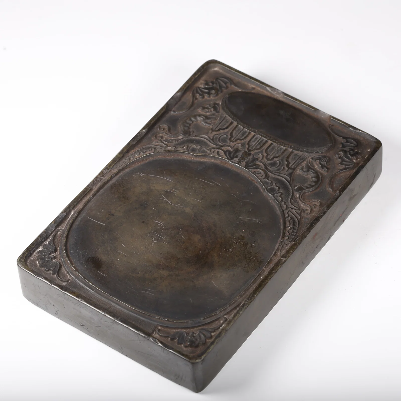 A DUANSHI STONE INKSTONE WITH TREASURE VASE MOTIF