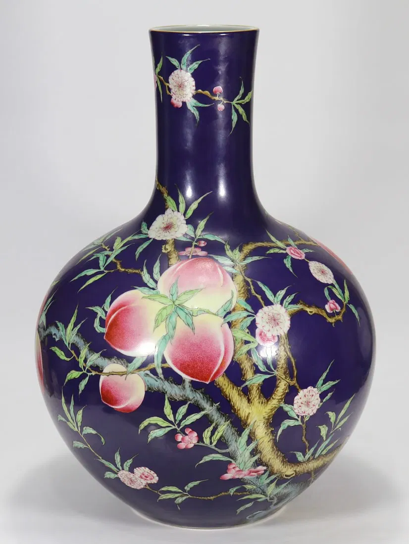 A Exquisite Aubergine Glaze Ground Bats and Peach Pattern Vase