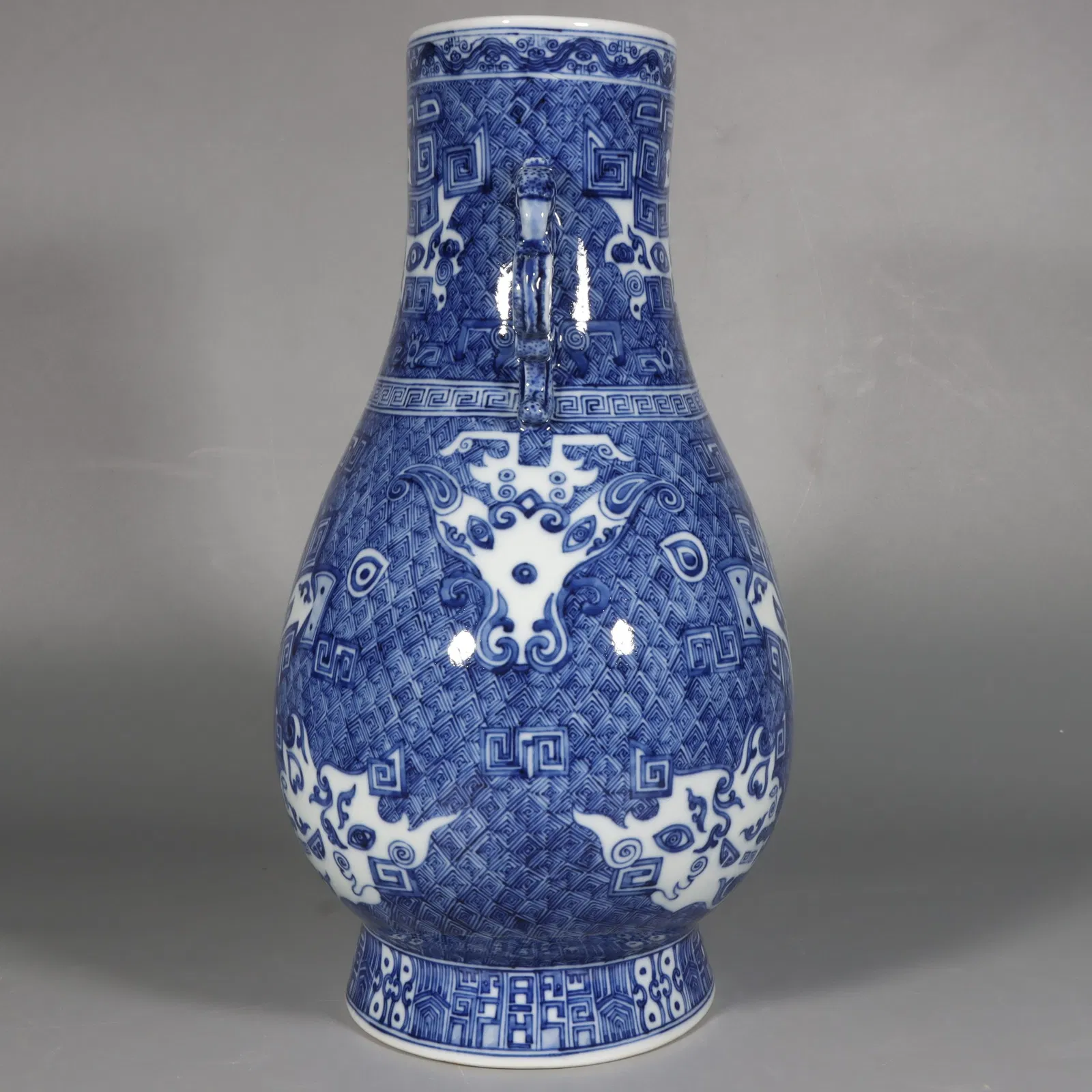 A Exquisite Blue and White Buffalo Pattern Beast-Ears Vase