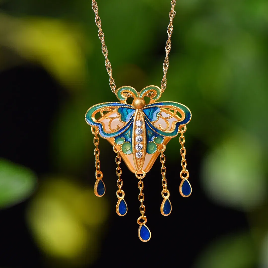A Exquisite Silver-Inlaid Hotan Jade Multiple Treasures Butterfly Pendant