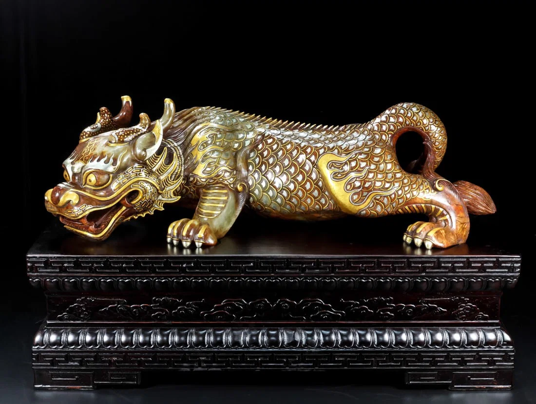 A Exquisiten Hotan Jade Auspicious Beast Ornament