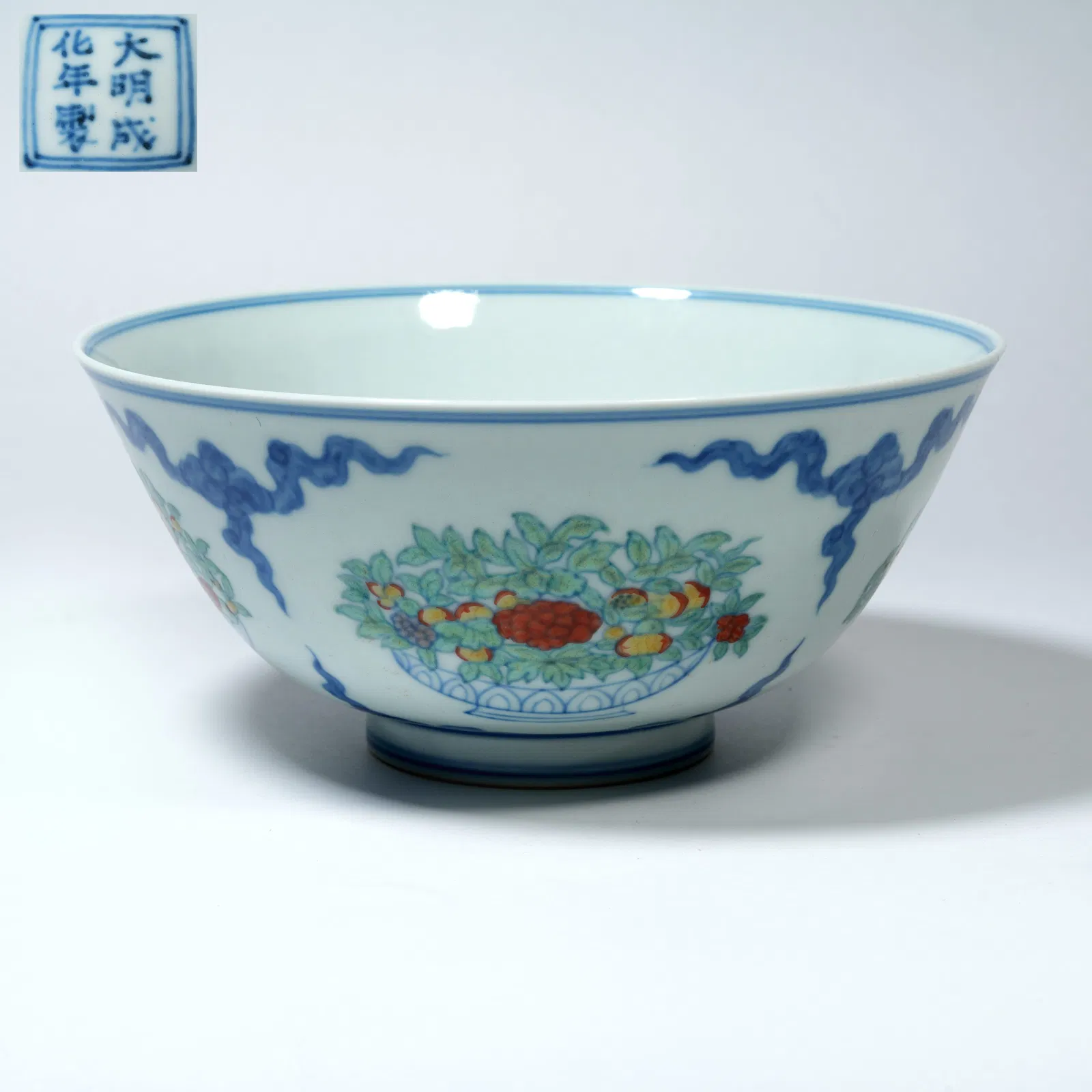 A FAMILLE-ROSE BOWL WITH MELON AND FRUIT MOTIFS