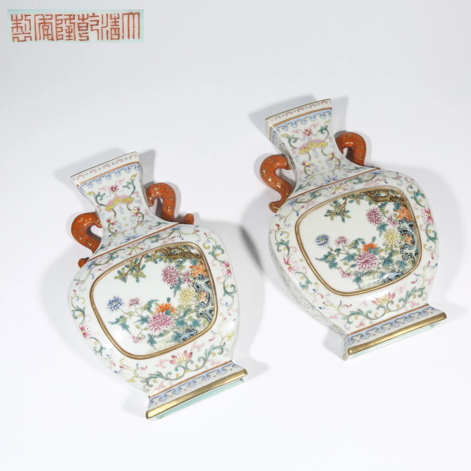A FAMILLE ROSE DONGSHI FLORAL PATTERN DOUBLE-EAR WALL VASE (SET)