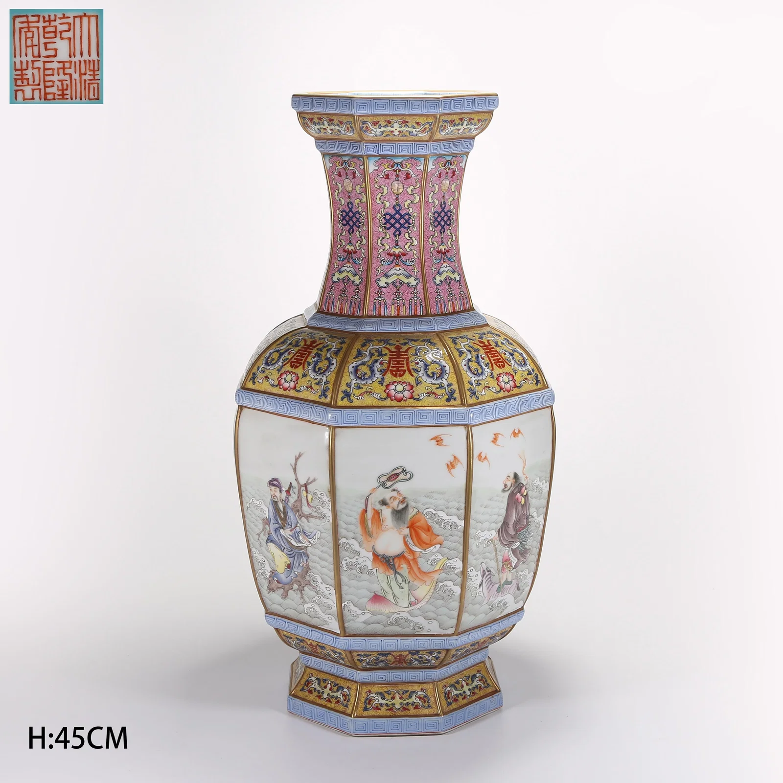A FAMILLE-ROSE EIGHT-SIDED VASE WITH RESERVED EIGHT IMMORTALS PANELS