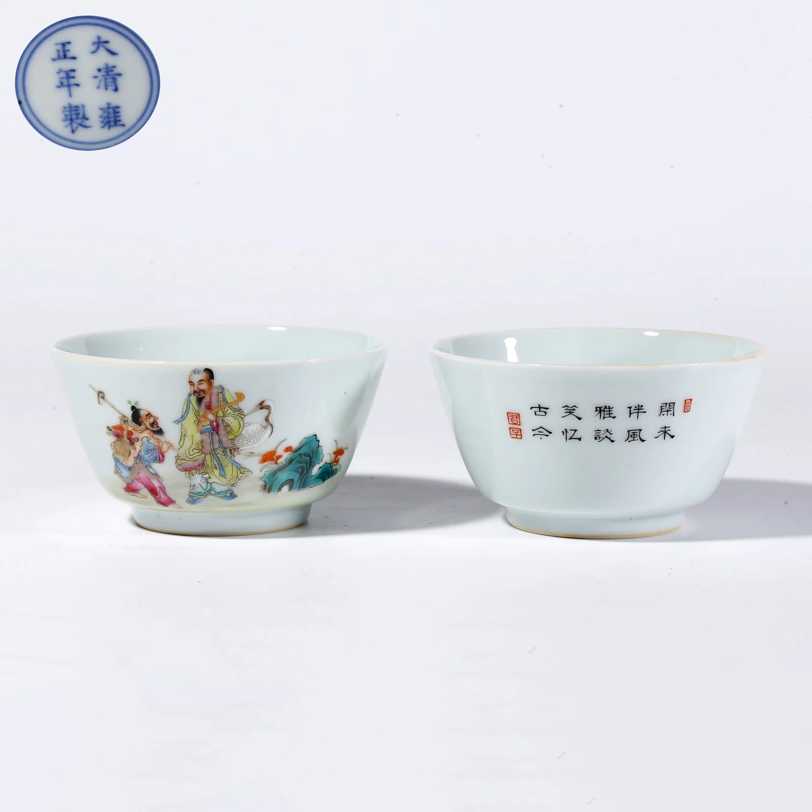 A FAMILLE ROSE FIGURE STORY CUPS (PAIR)
