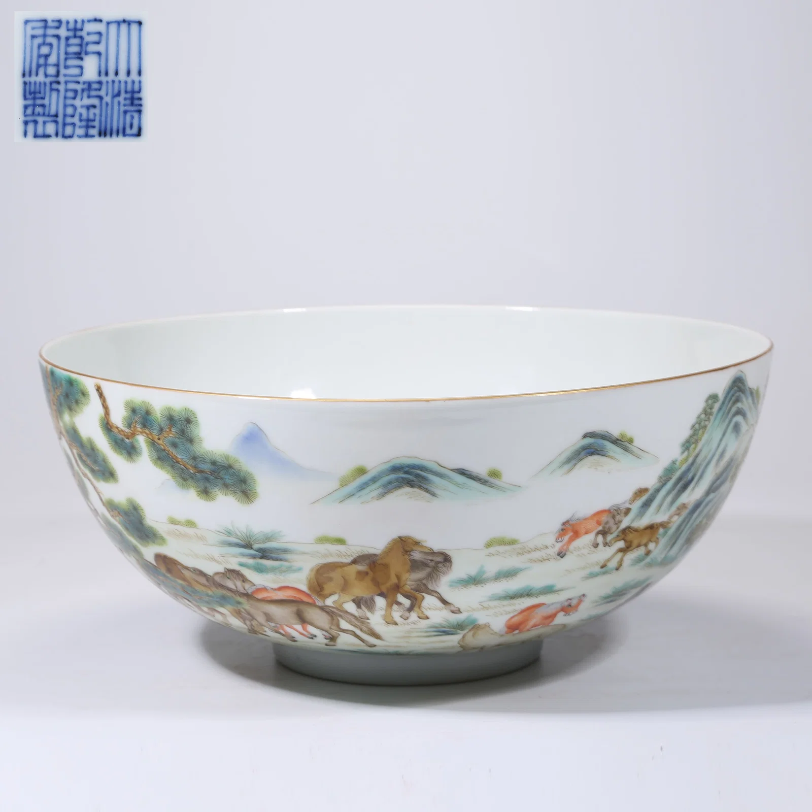A FAMILLE-ROSE LARGE BOWL WITH GALLOPING HORSE DESIGN