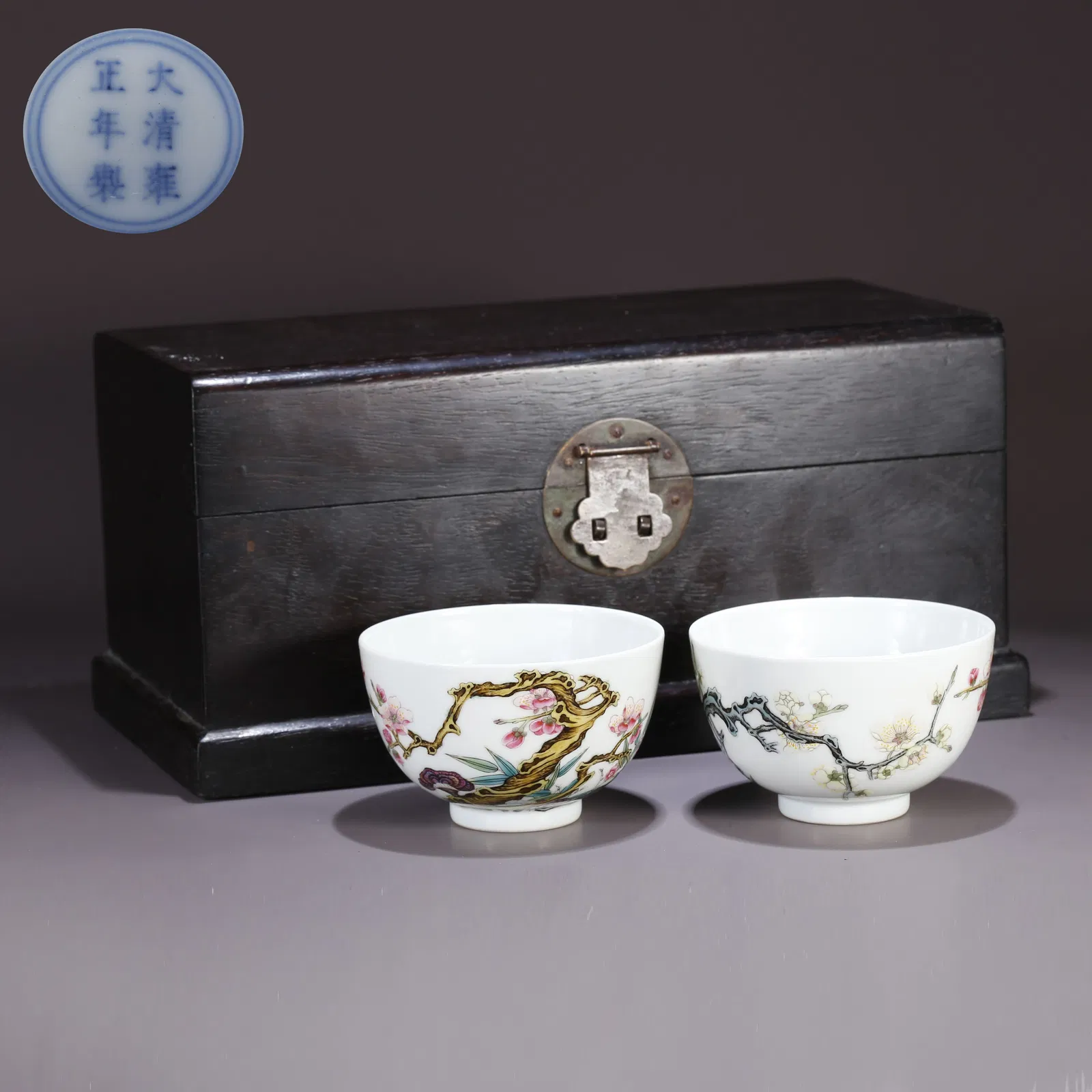 A FAMILLE ROSE PLUM BLOSSOM PATTERN CUP (PAIR)
