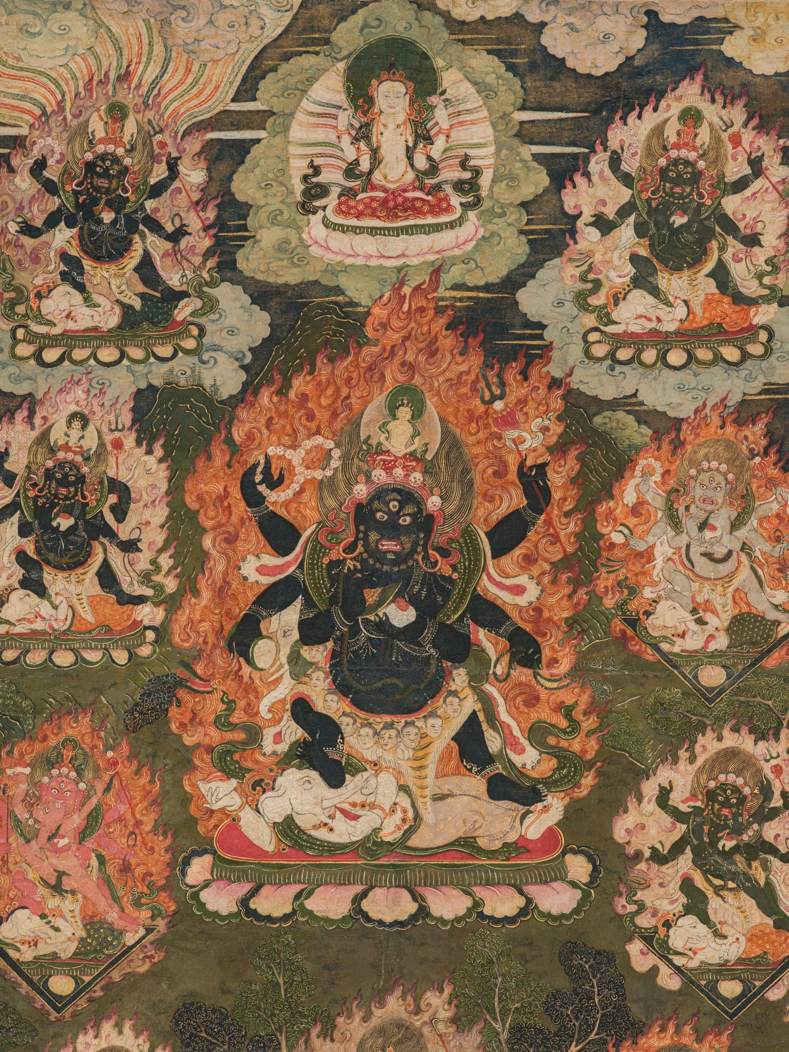 A FINE AND PARCEL-GILT THANGKA OF SHADBHUJA MAHAKALA, TIBETAN-CHINESE, 18TH CENTURY