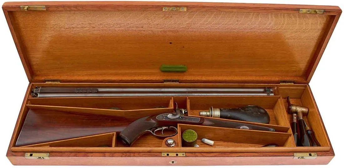 A FINE AND RARE CASED .451 WHITWORTH PERCUSSION DOUBLE SPORTING RIFLE,