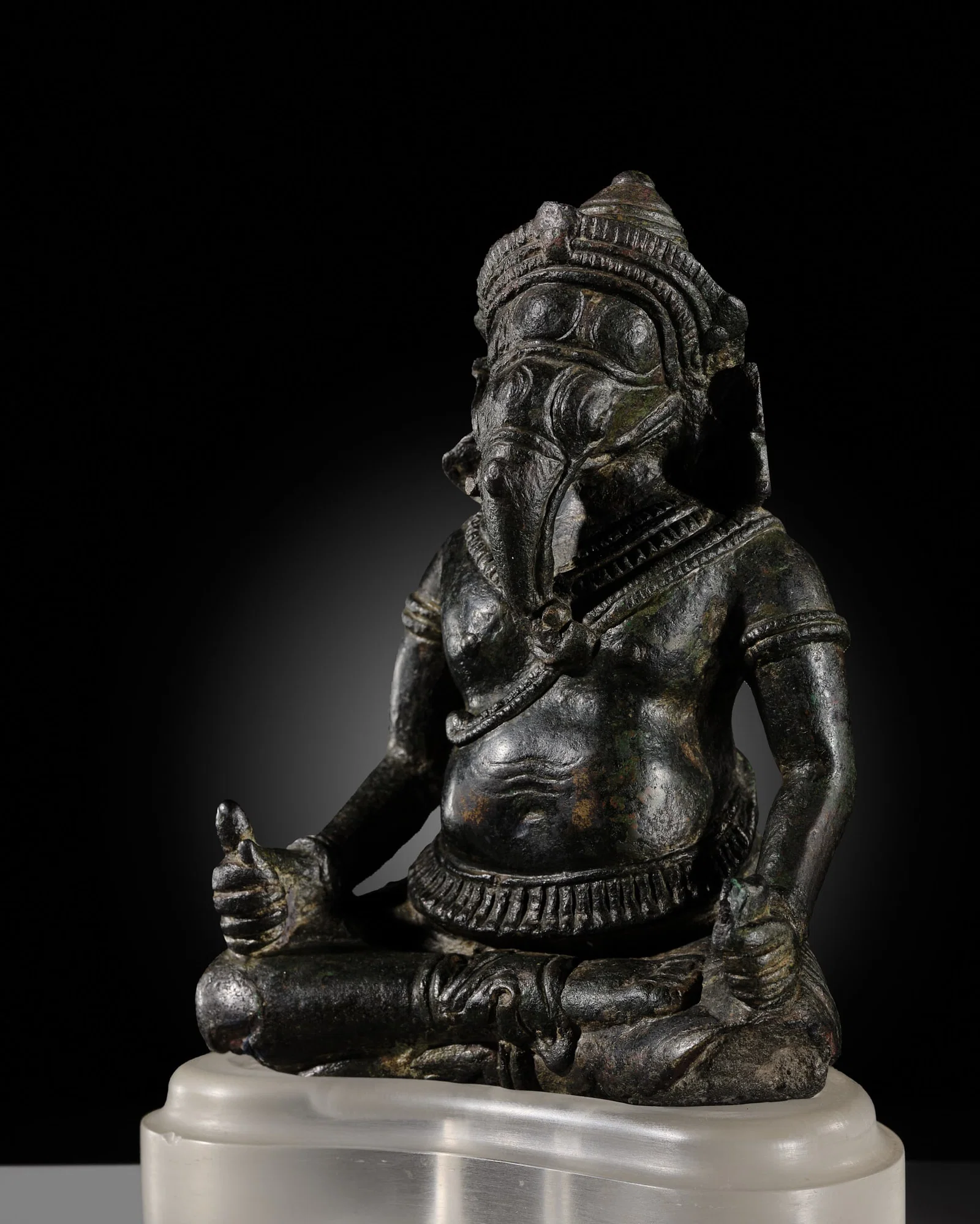 A FINE BRONZE FIGURE OF GANESHA, KHMER EMPIRE, ANGKOR PERIOD