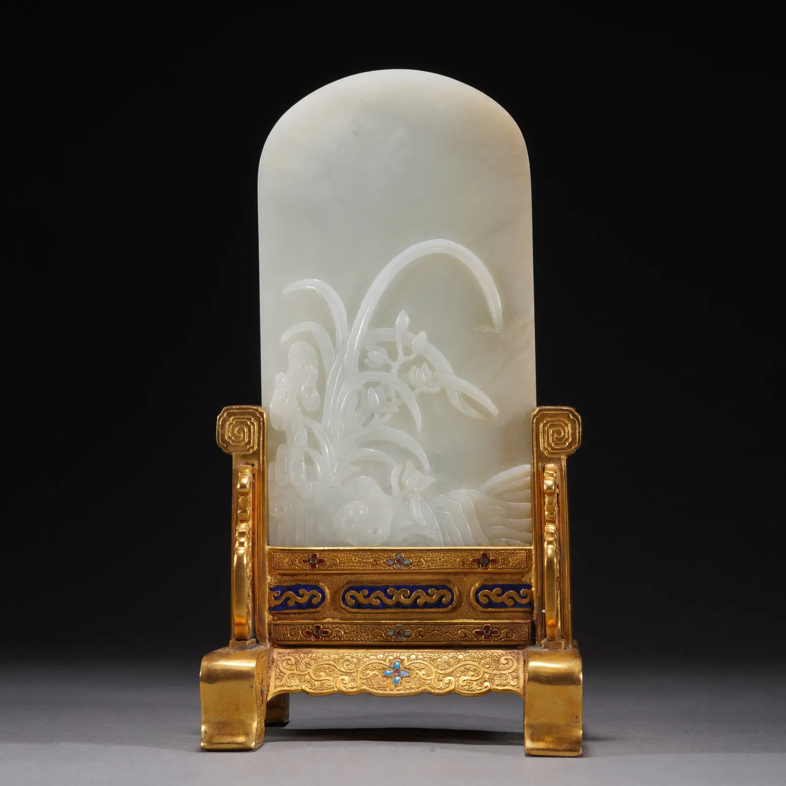 A FINE CARVED WHITE JADE INLAID BRONZE-GILT TABLE SCREEN