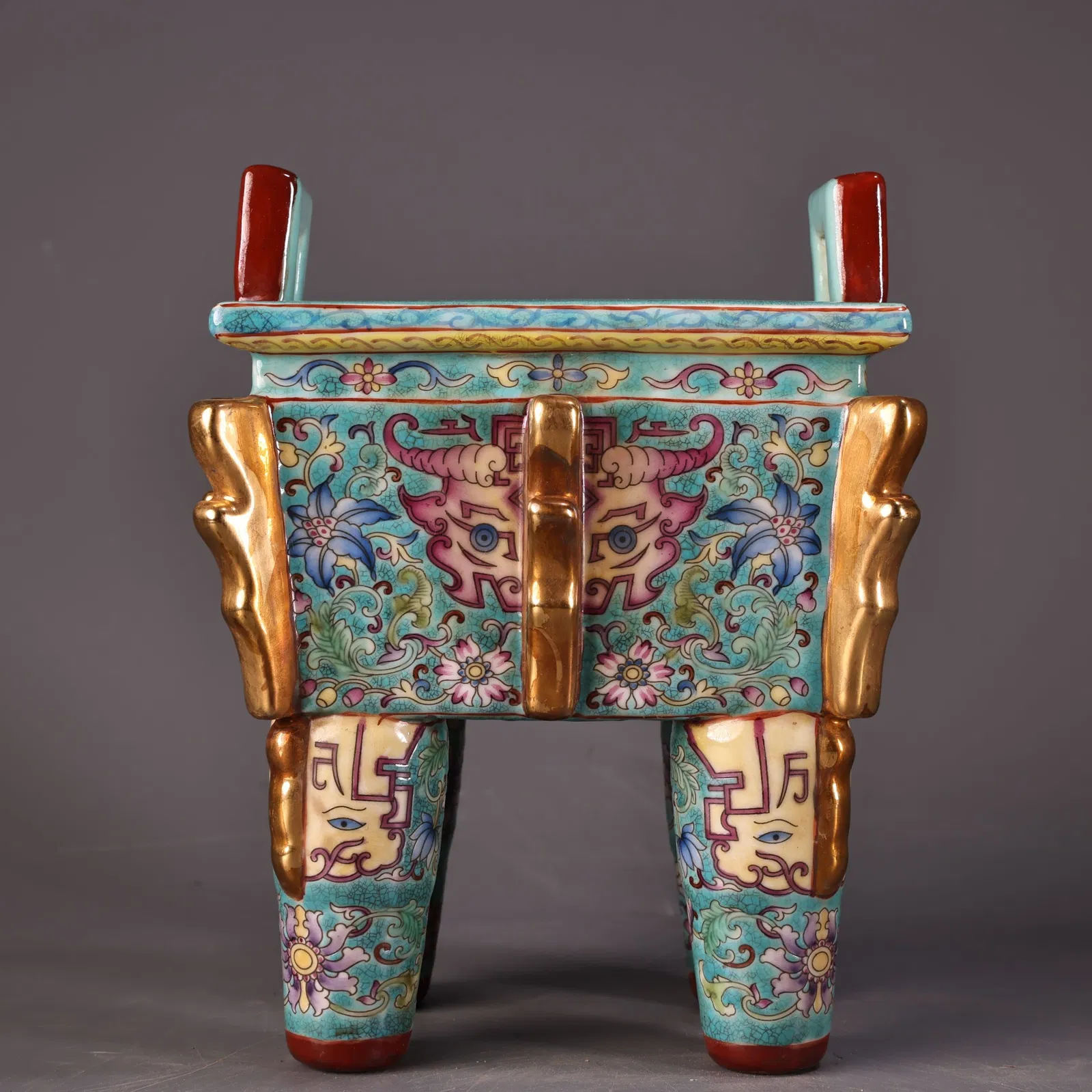 A fine enamel colored gold-painted porcelain square tripod