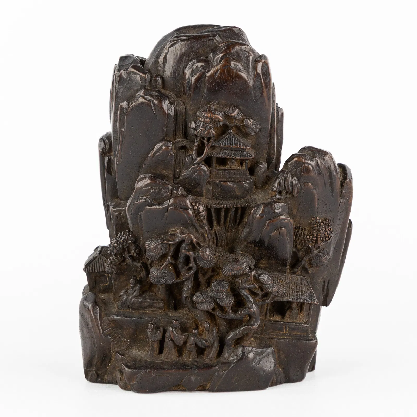 A Finely Sculptured Chinese 'Zitan' rock landscape with pagodas and figurines.