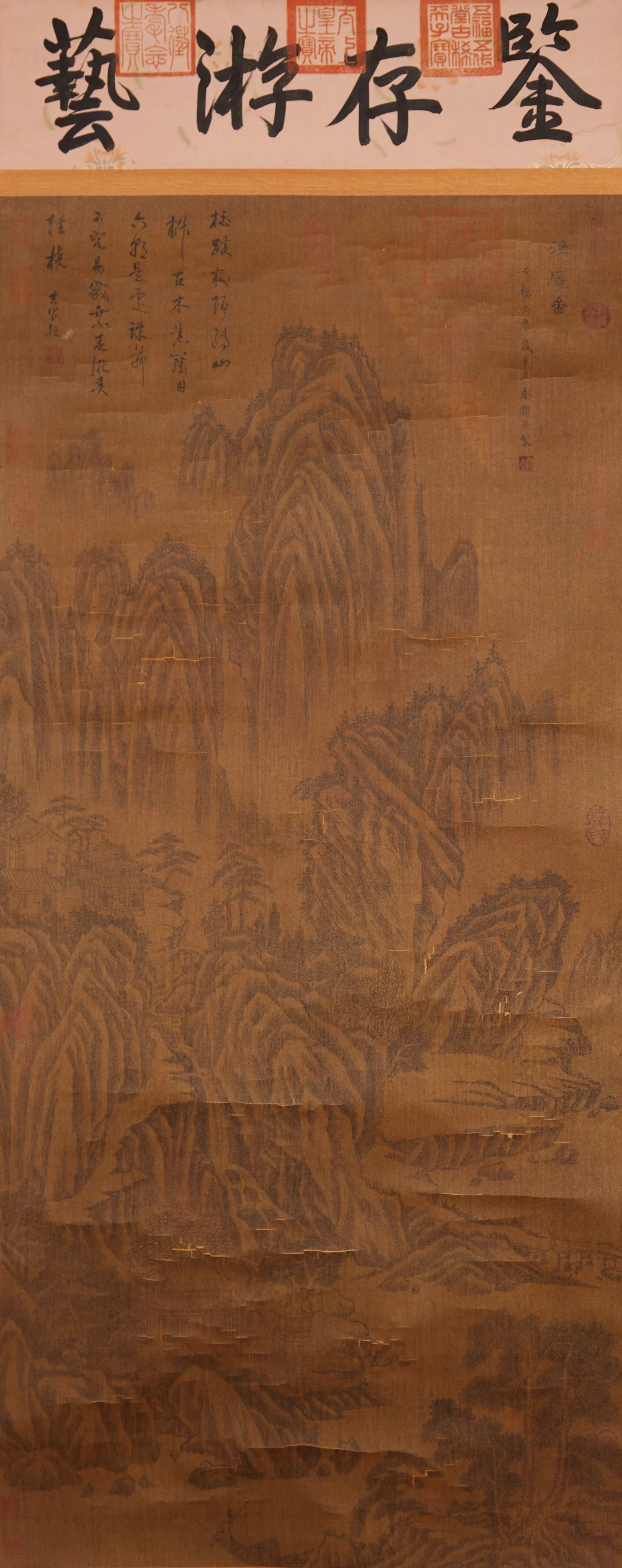 A "FISHERMAN IN SECLUSION", PAINTING ON SILK BY GUAN TONG.關仝