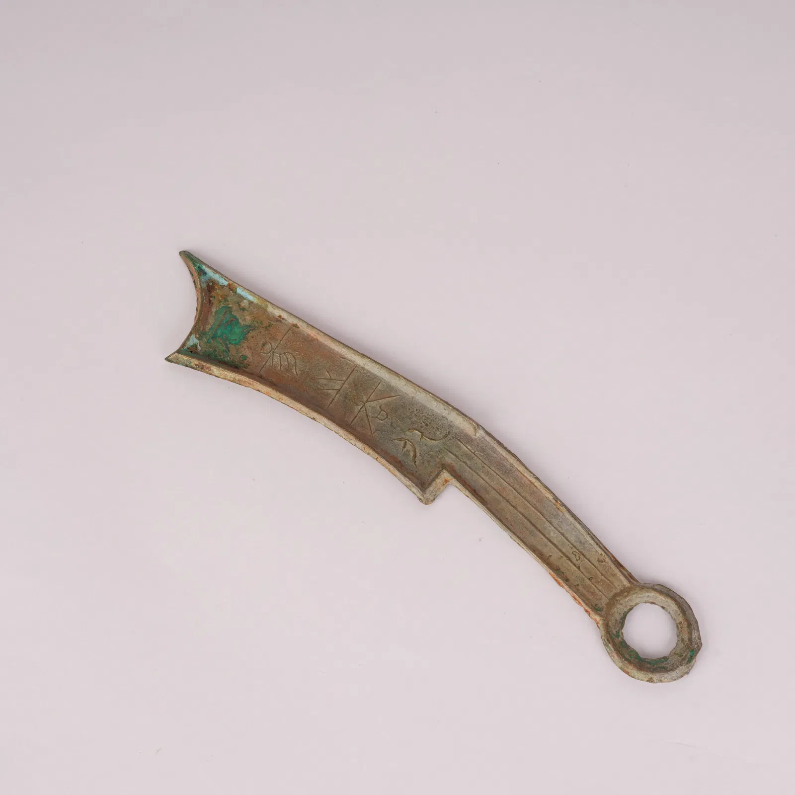 A FIVE-CHARACTER KNIFE COINS, WARRING STATES PERIOD