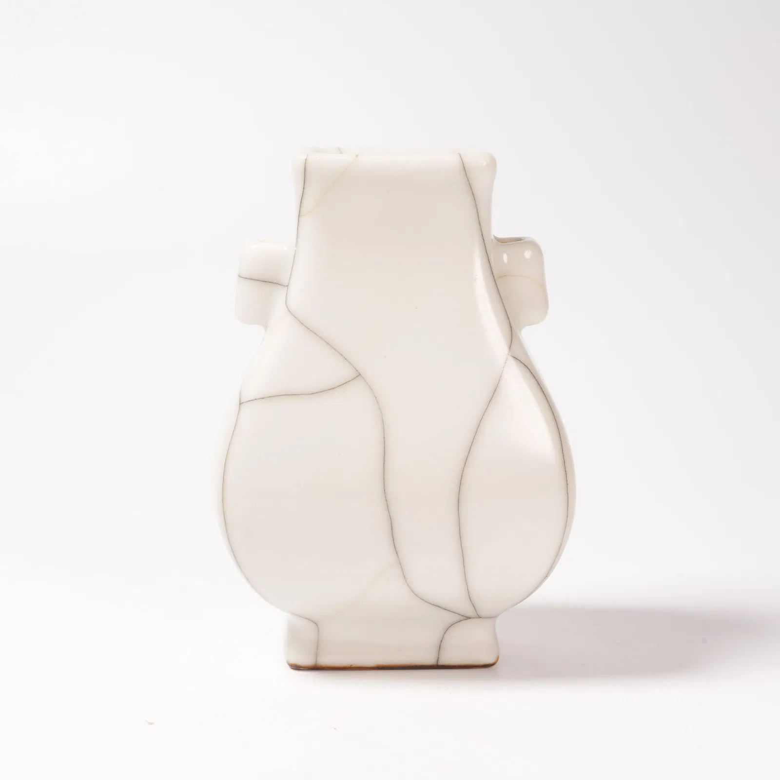 A GE KILN EARED BOTTLE