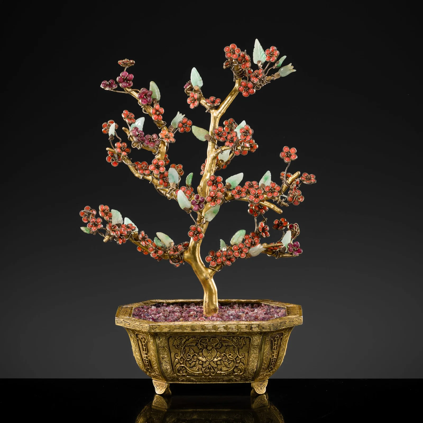 A GEMSTONE-INLAID PRUNUS TREE IN A GILT-BRONZE JARDINIÈRE, 18TH-19TH CENTURY